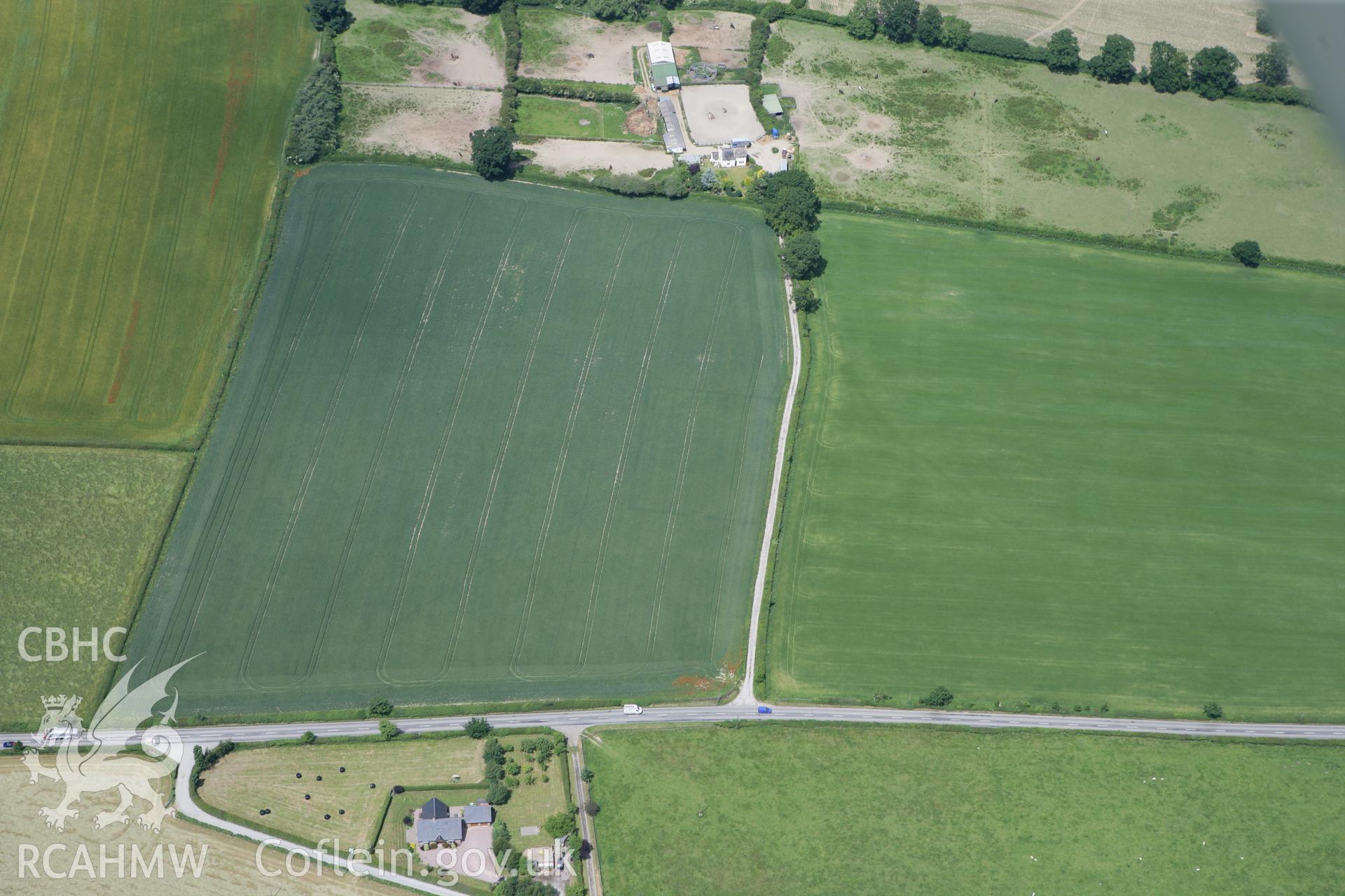 RCAHMW colour oblique photograph of Brompton (Pentrehyling) Roman Fort and Marching Camp. Taken by Toby Driver on 21/06/2010.