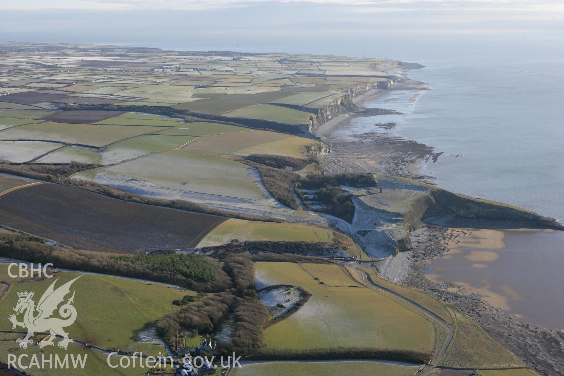 RCAHMW colour oblique photograph of Dunraven Hillfort, and south Glamorgan coast. Taken by Toby Driver on 08/12/2010.