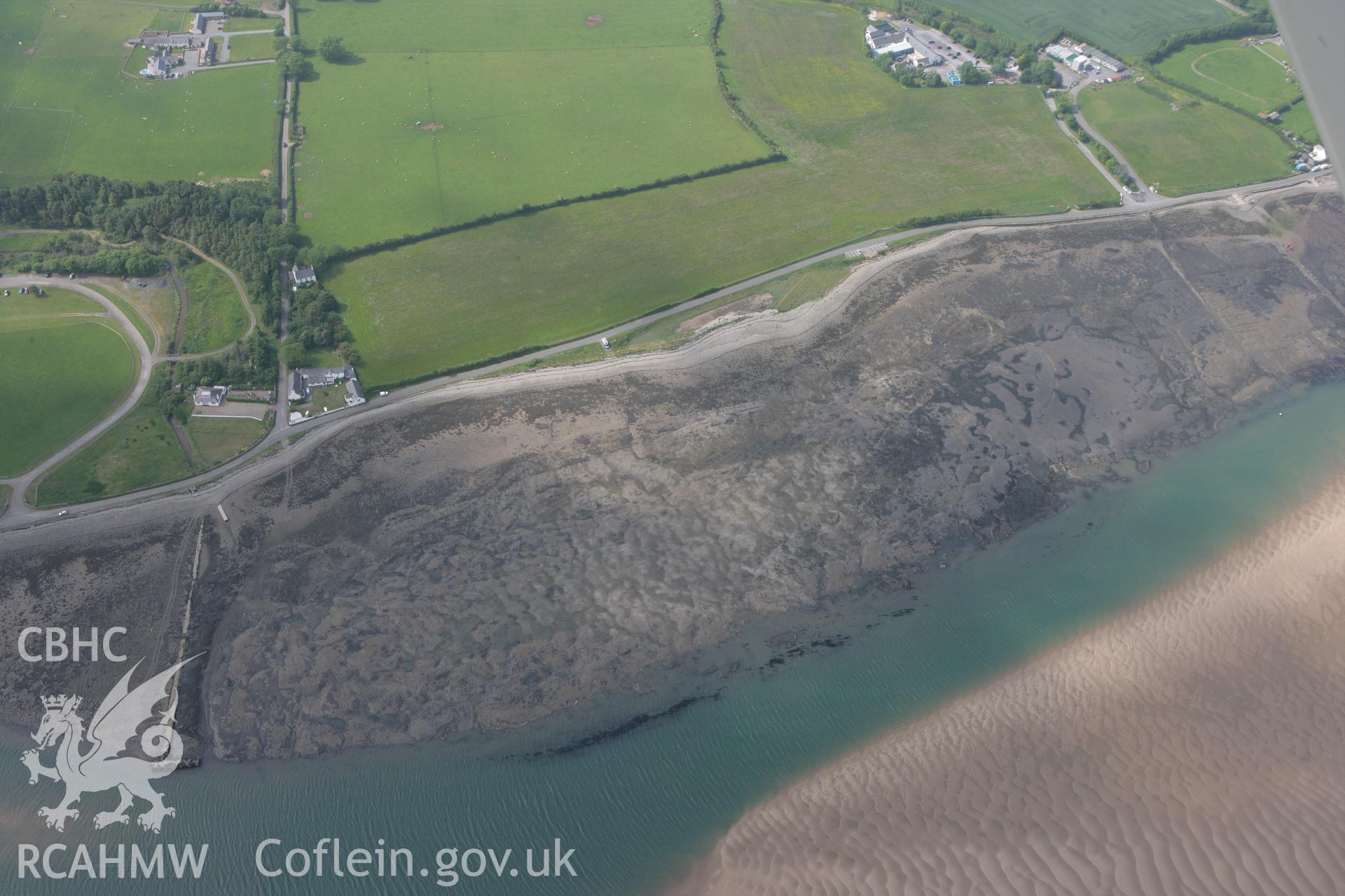 RCAHMW colour oblique photograph of Taicochion, Roman settlement, fields and foreshore near. Taken by Toby Driver on 10/06/2010.