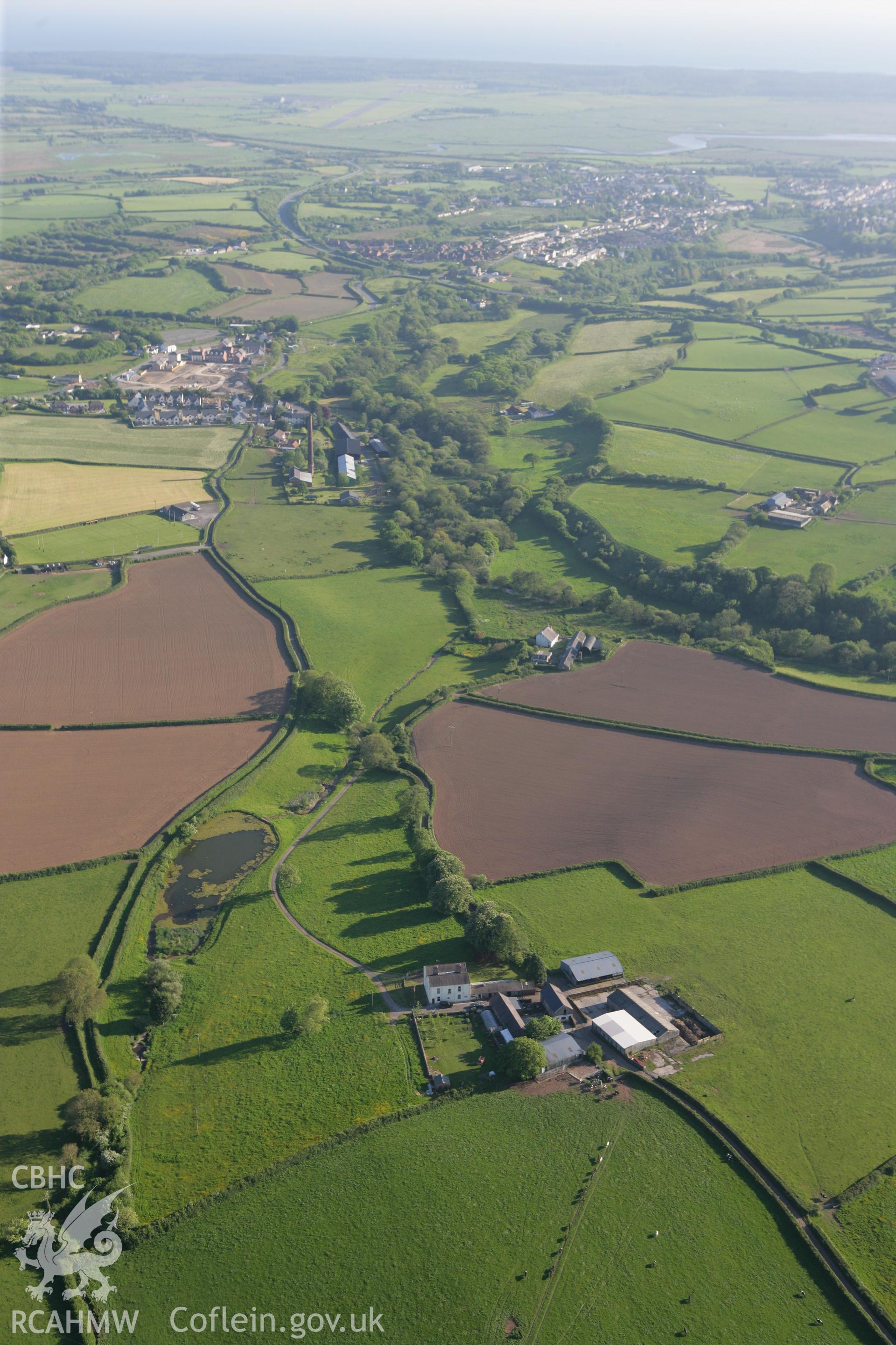 RCAHMW colour oblique photograph of Kidwelly Old Tinplate Works and Dam. Taken by Toby Driver on 24/05/2010.