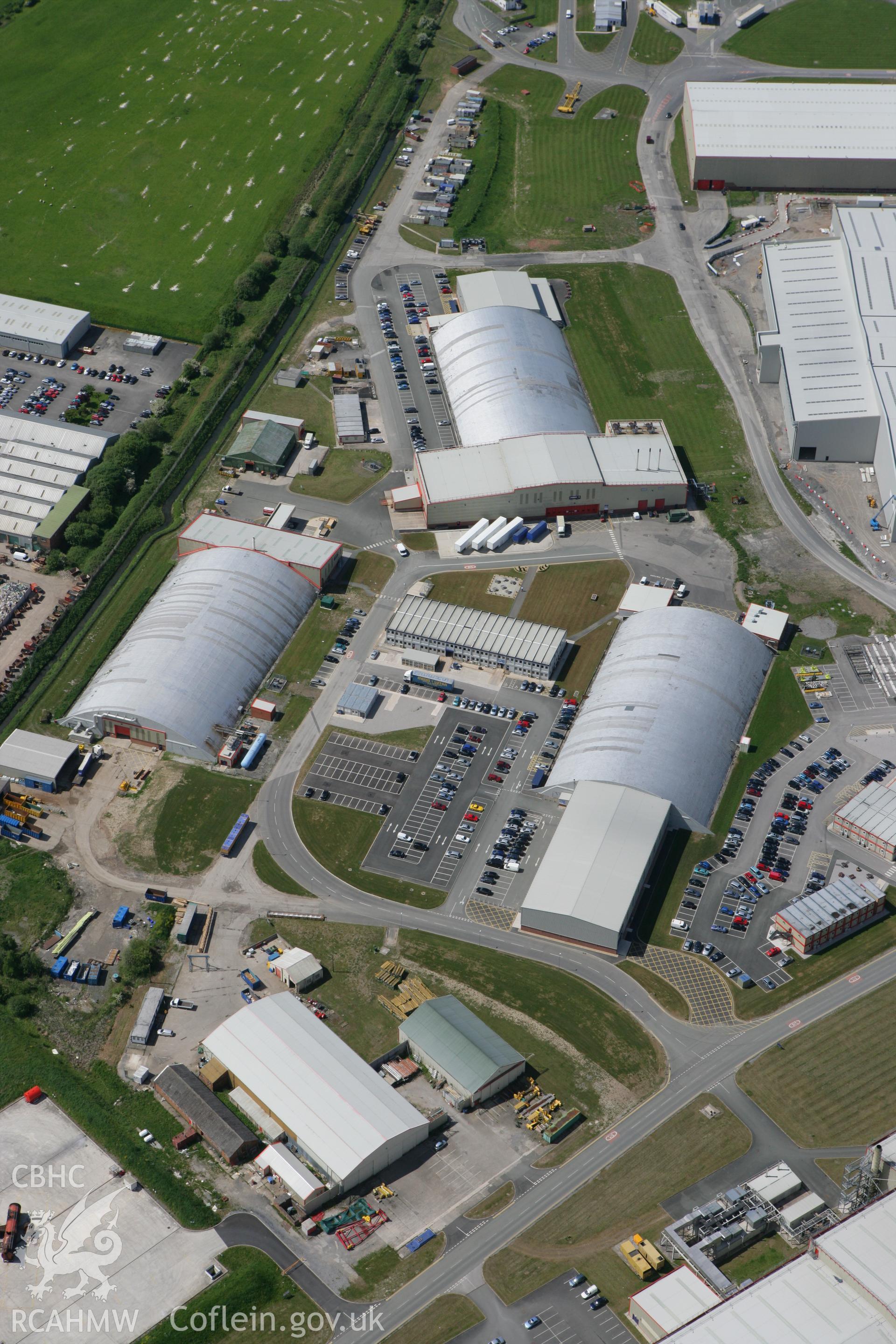 RCAHMW colour oblique photograph of Aircraft Hangers, Harwarden Airport. Taken by Toby Driver on 27/05/2010.