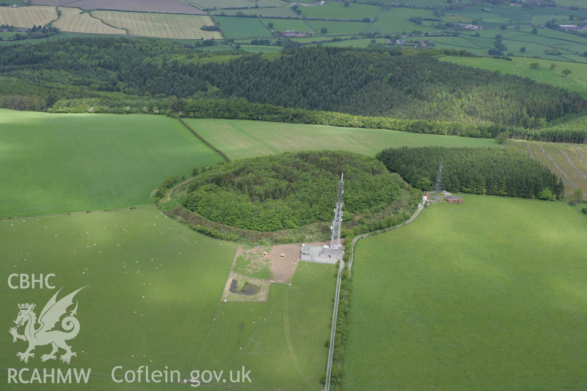 RCAHMW colour oblique photograph of Beacon Ring fort (Caer Digoll). Taken by Toby Driver on 27/05/2010.