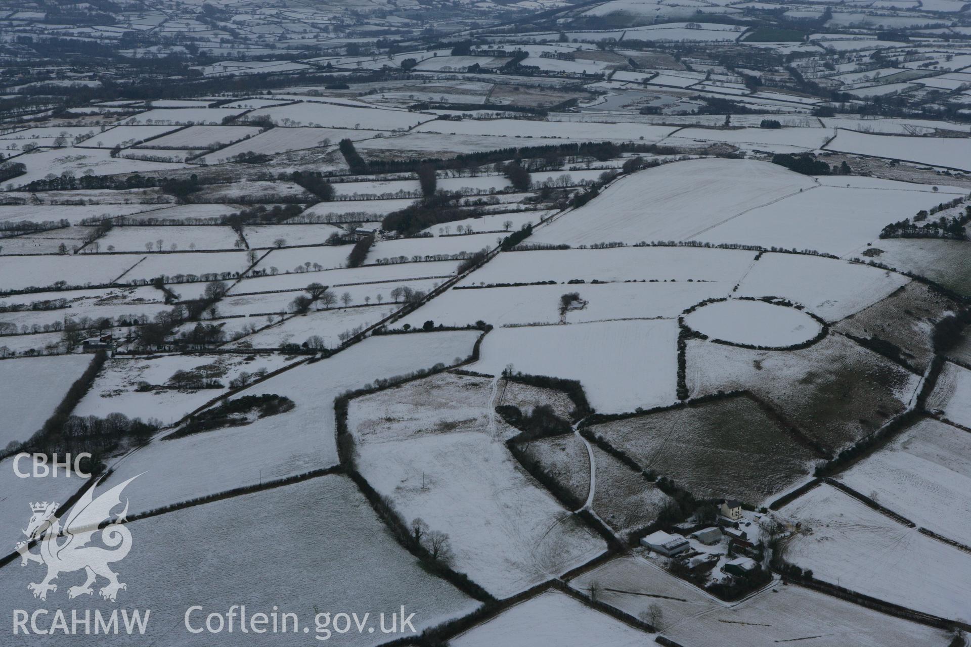 RCAHMW colour oblique photograph of Cribyn Clottas hillfort. Taken by Toby Driver on 02/12/2010.