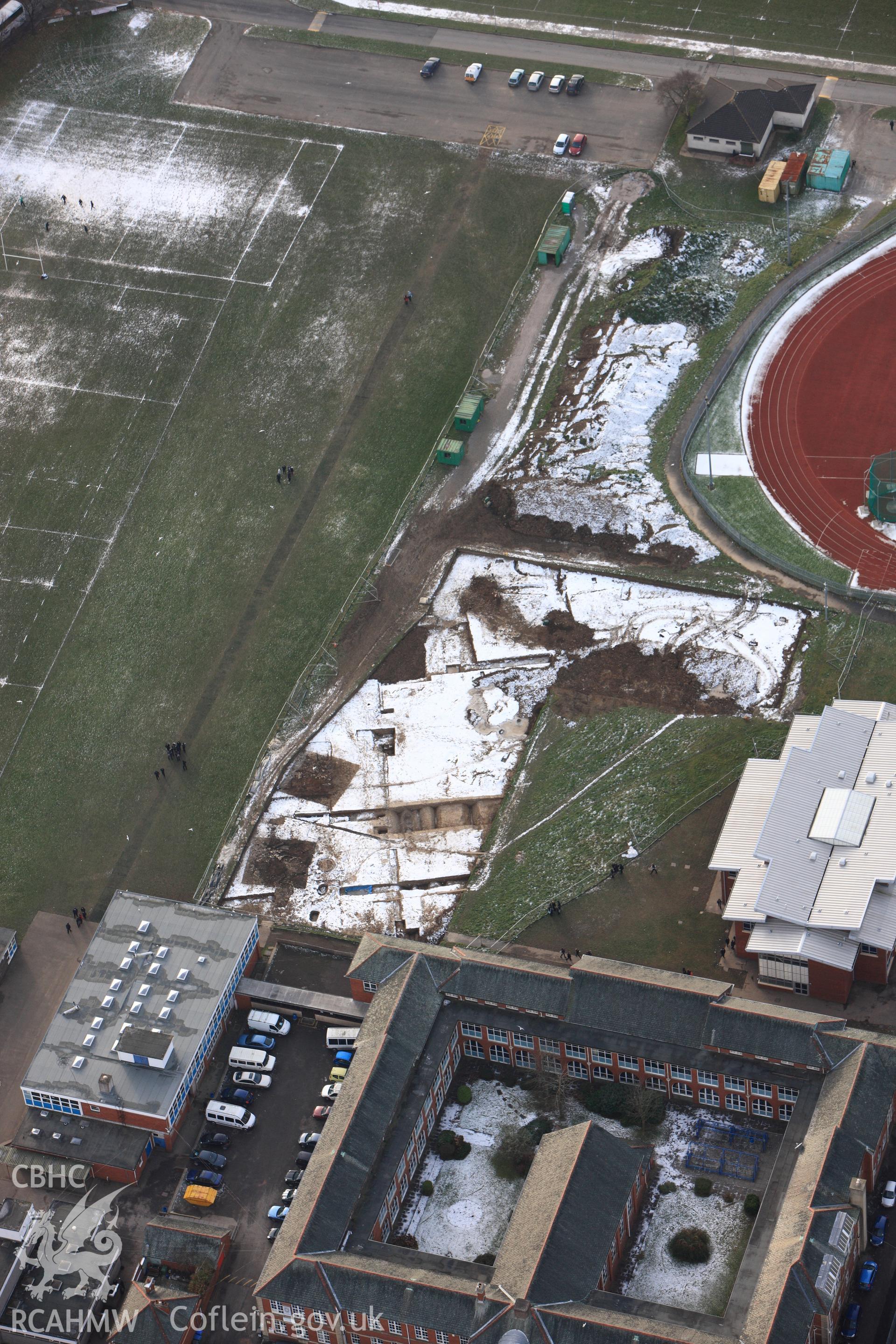 RCAHMW colour oblique photograph of Neath Auxilary Fort, under excavation by GGAT. Taken by Toby Driver on 01/12/2010.