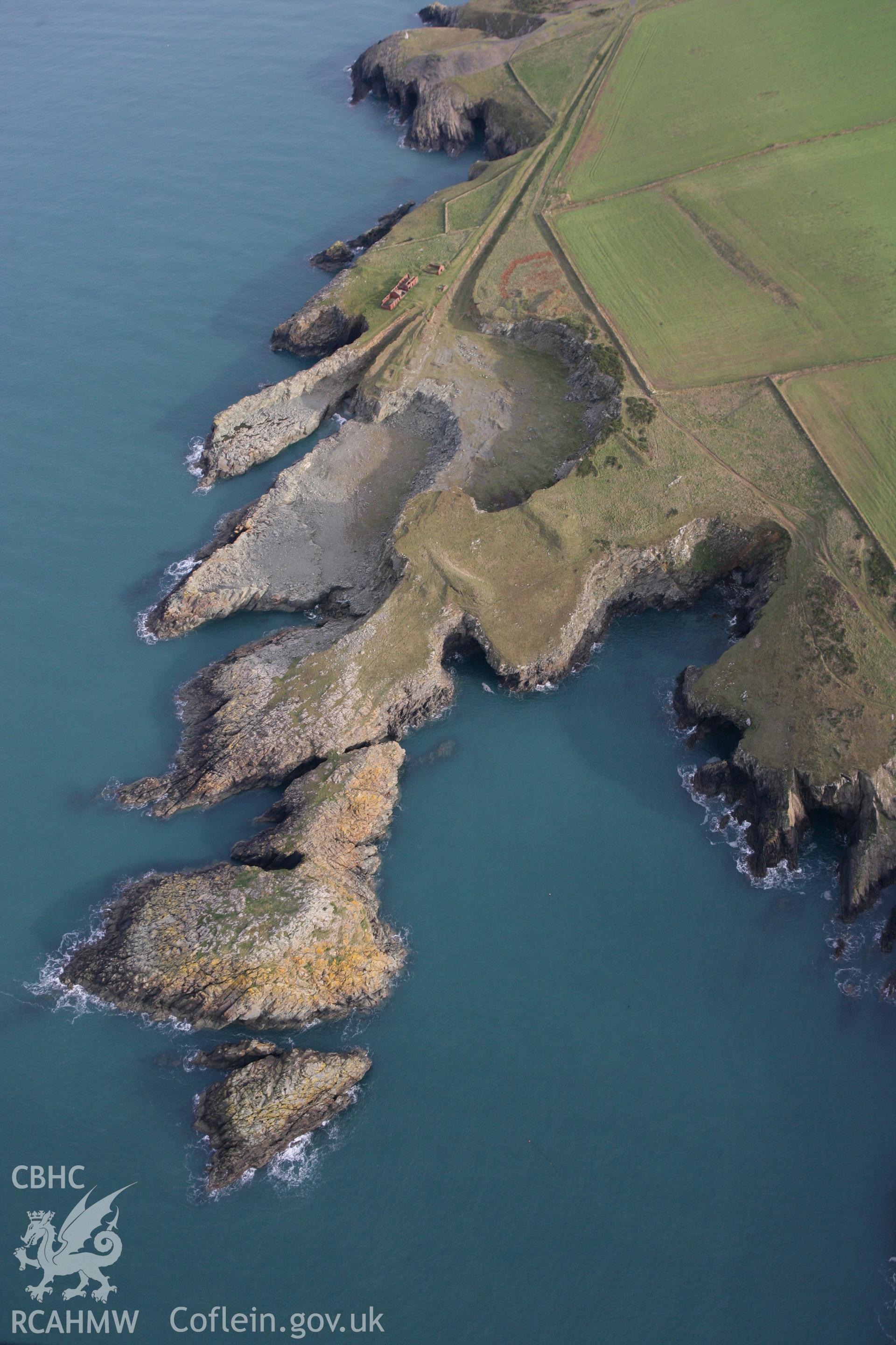 RCAHMW colour oblique photograph of Porthgain Quarries. Taken by Toby Driver on 16/11/2010.