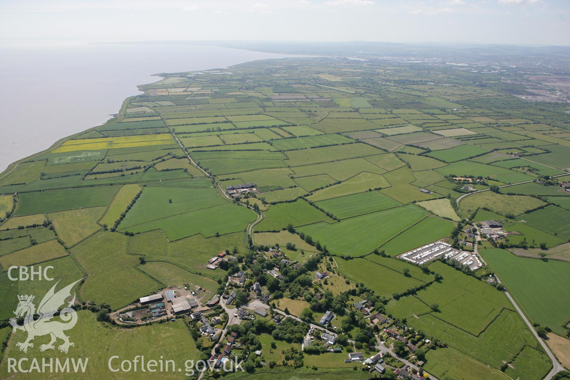 RCAHMW colour oblique photograph of landscape looking east over Redwick towards Newport Docks. Taken by Toby Driver on 21/06/2010.