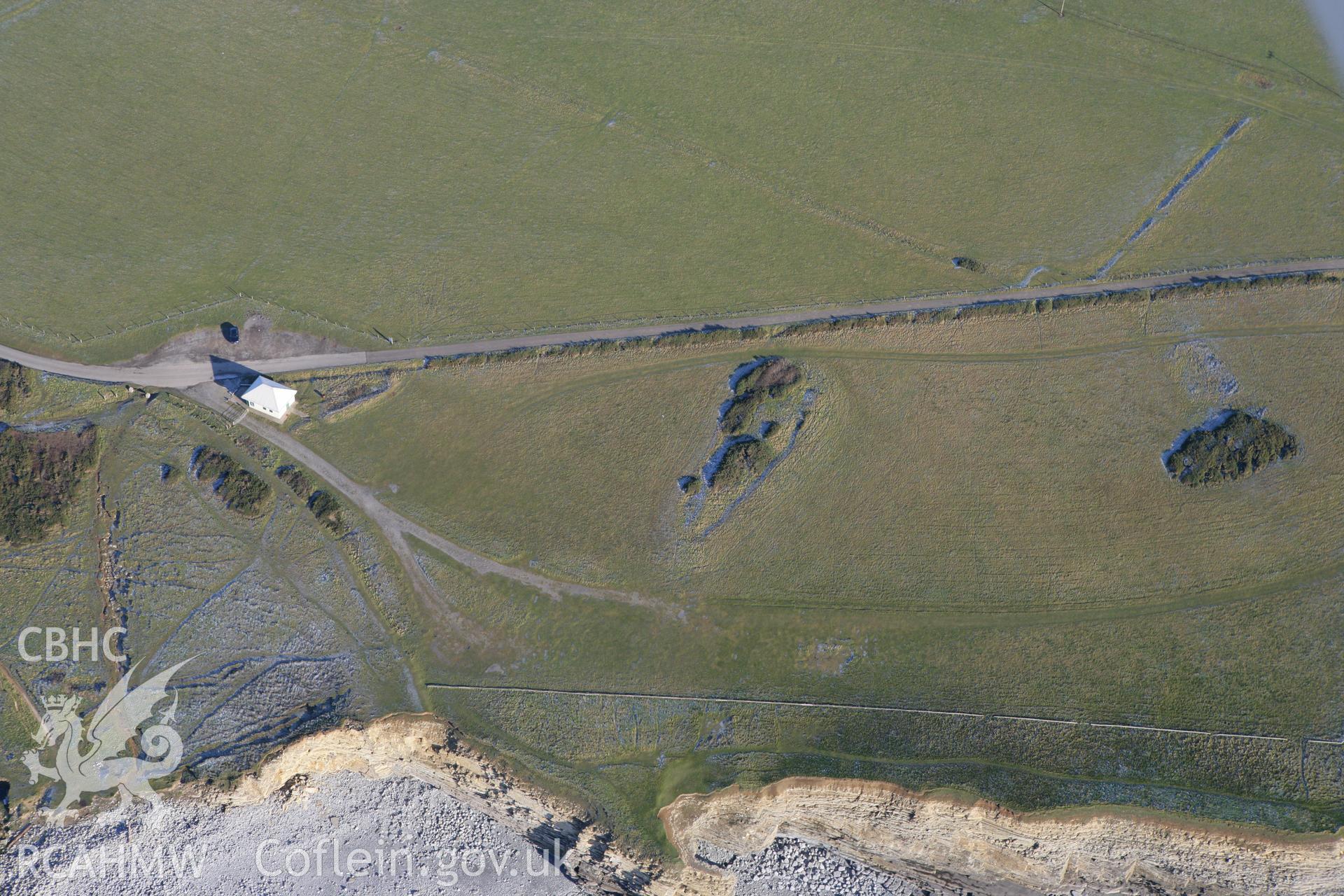 RCAHMW colour oblique photograph of Cae'r Eglwys, long cairn. Taken by Toby Driver on 08/12/2010.