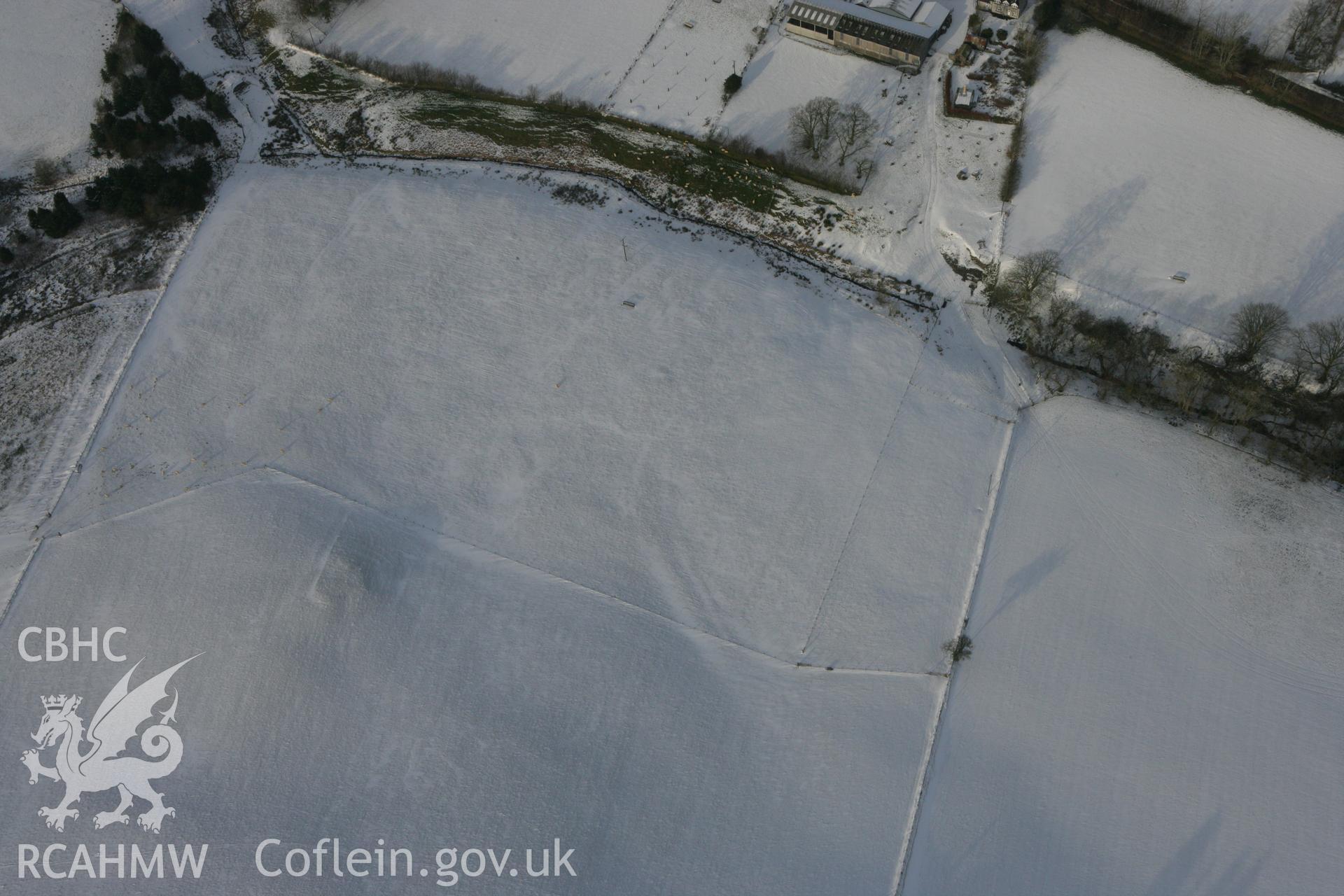 RCAHMW colour oblique photograph of Bwlchcrwys prehistoric enclosure and barrow. Taken by Toby Driver on 02/12/2010.