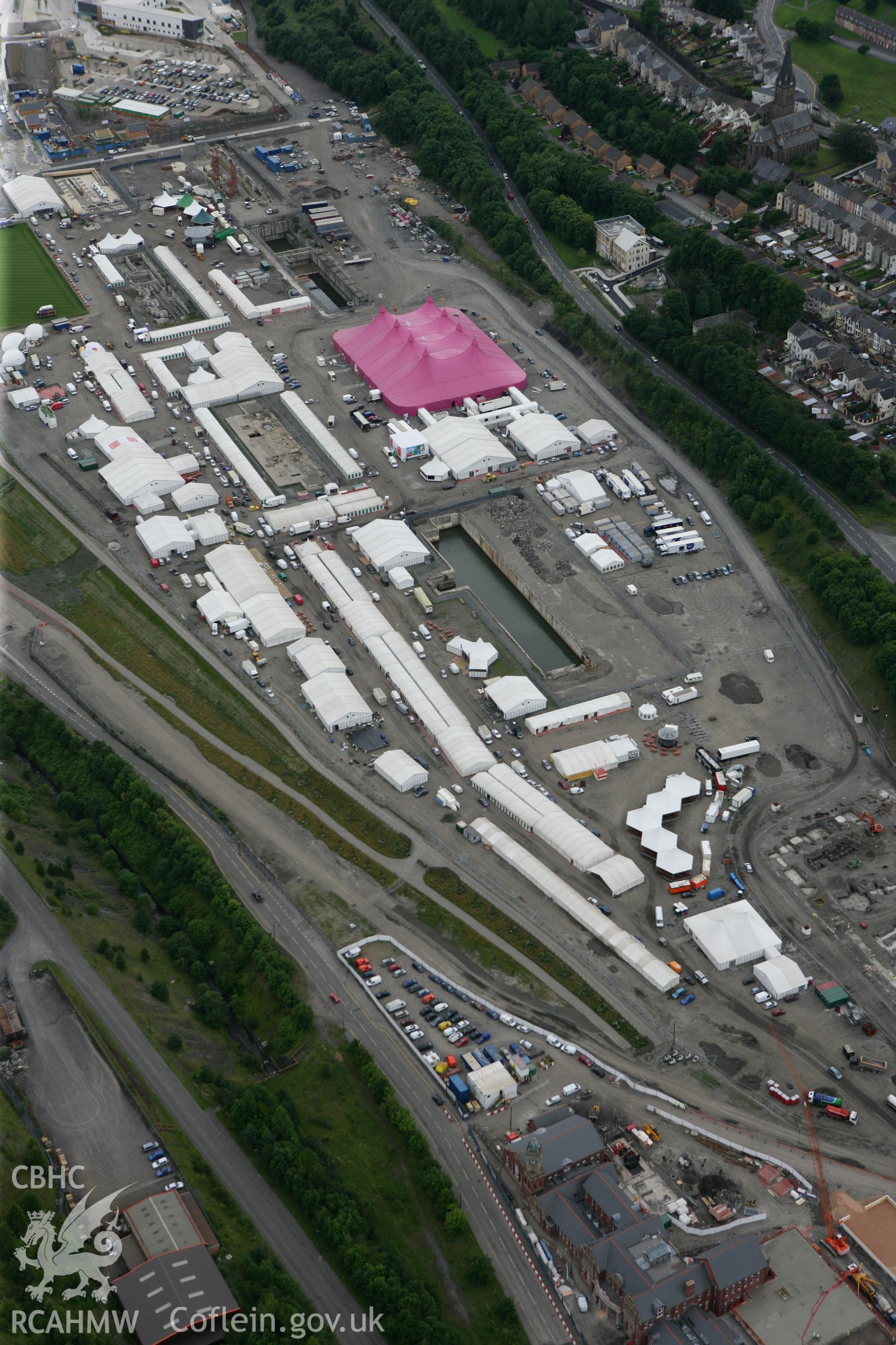 RCAHMW colour oblique photograph of National Eisteddfod of Wales 2010, on the site of the Ebbw Vale Steelworks. Taken by Toby Driver on 29/07/2010.