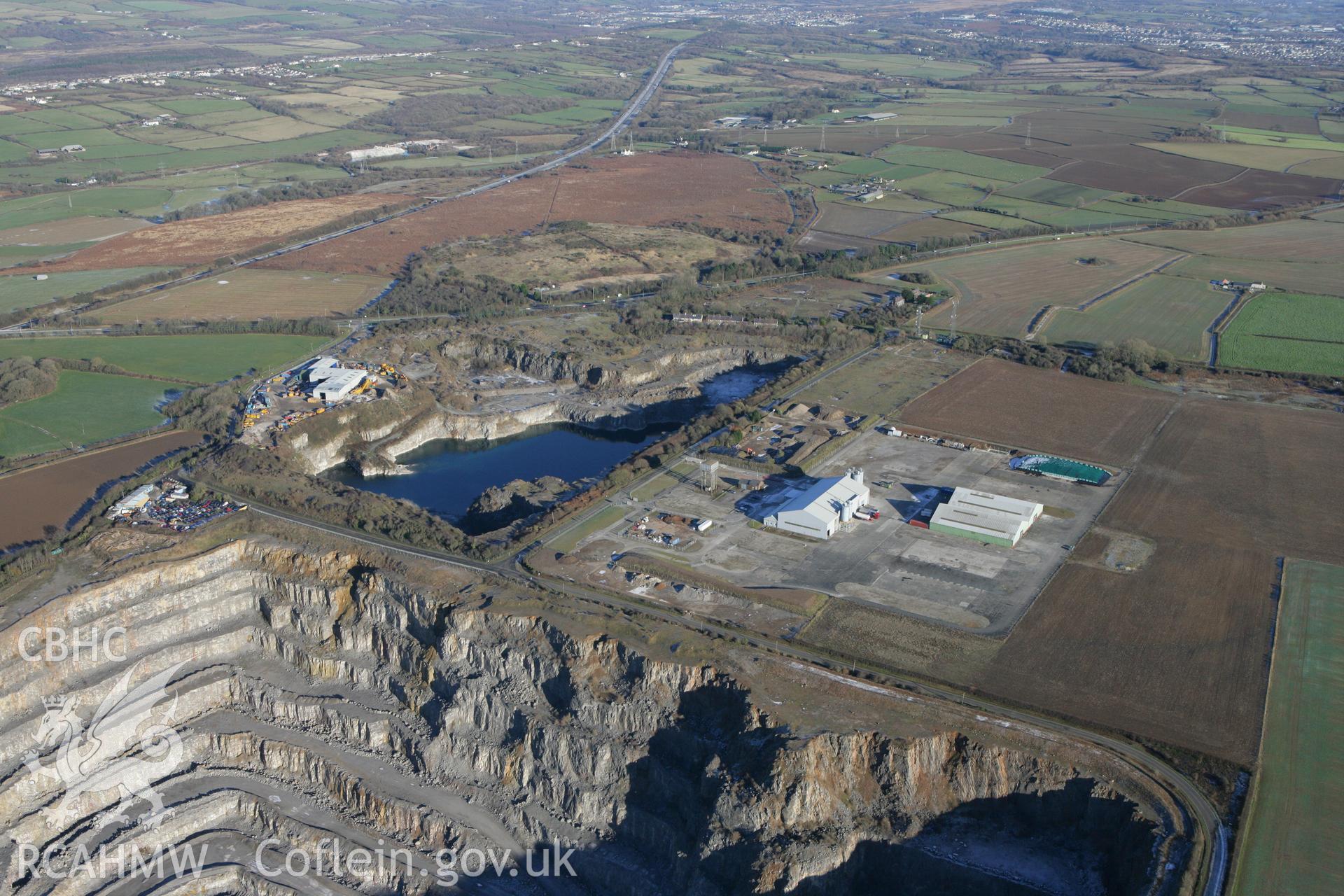 RCAHMW colour oblique photograph of Stormy Down Airfield landscape. Taken by Toby Driver on 08/12/2010.