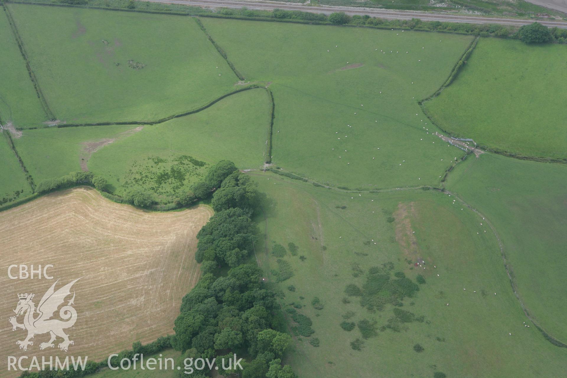 RCAHMW colour oblique photograph of Hendre-Waelod Burial chamber. Taken by Toby Driver on 10/06/2010.