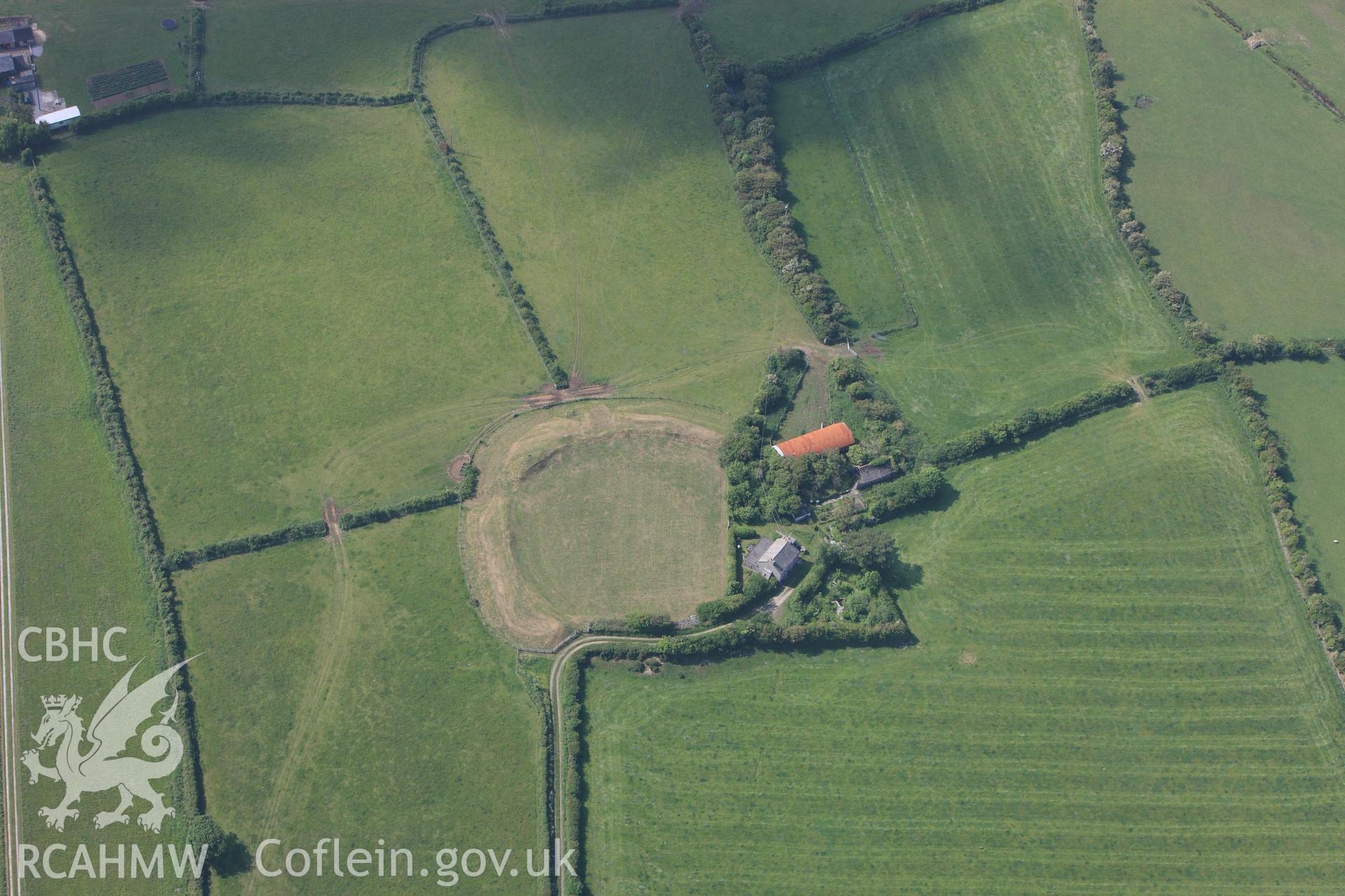 RCAHMW colour oblique photograph of Castell Bryn Gwyn, Neolithic henge and later ringwork. Taken by Toby Driver on 10/06/2010.