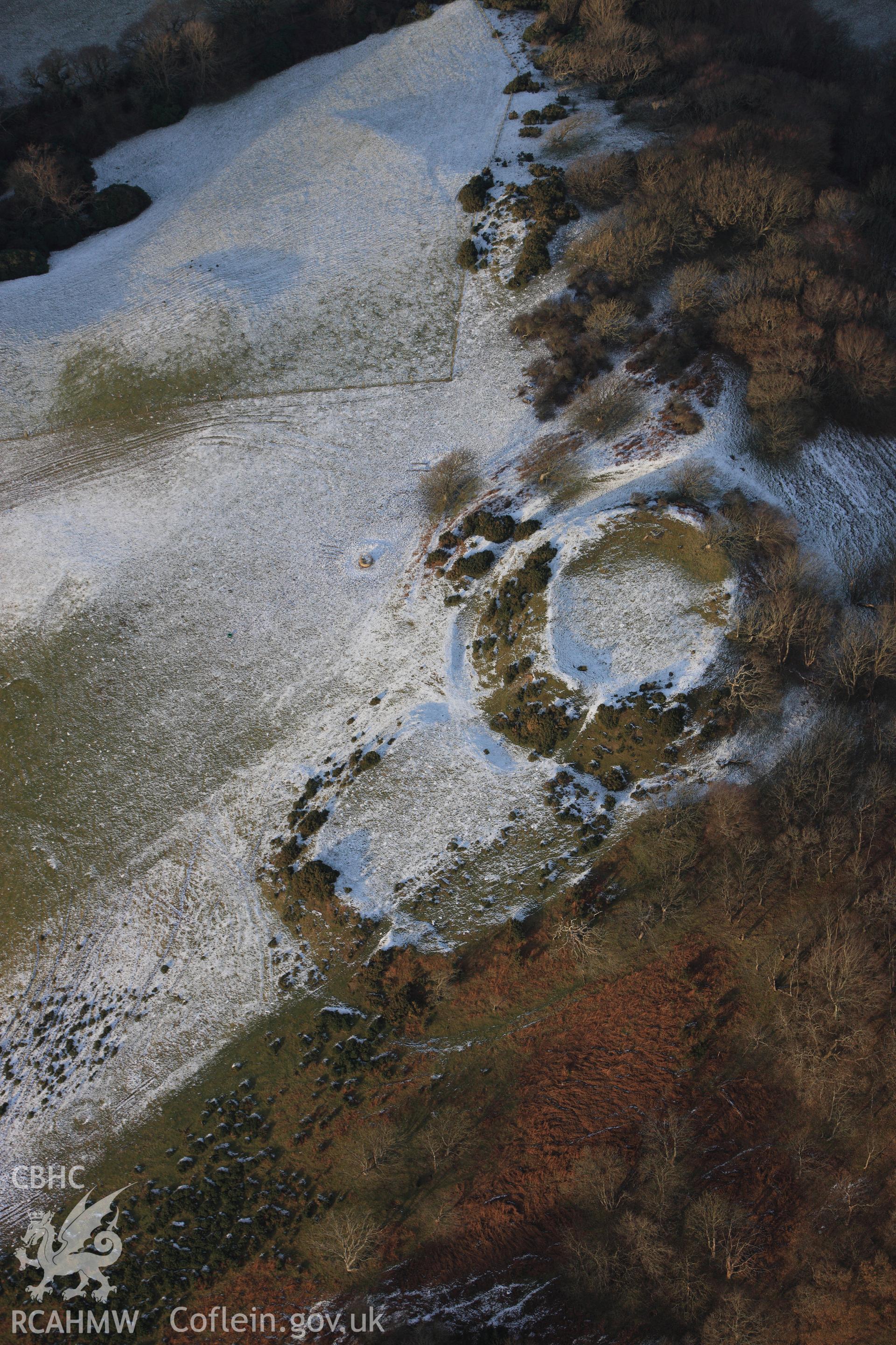 RCAHMW colour oblique photograph of Castell Tan y Castell, with snow. Taken by Toby Driver on 02/12/2010.