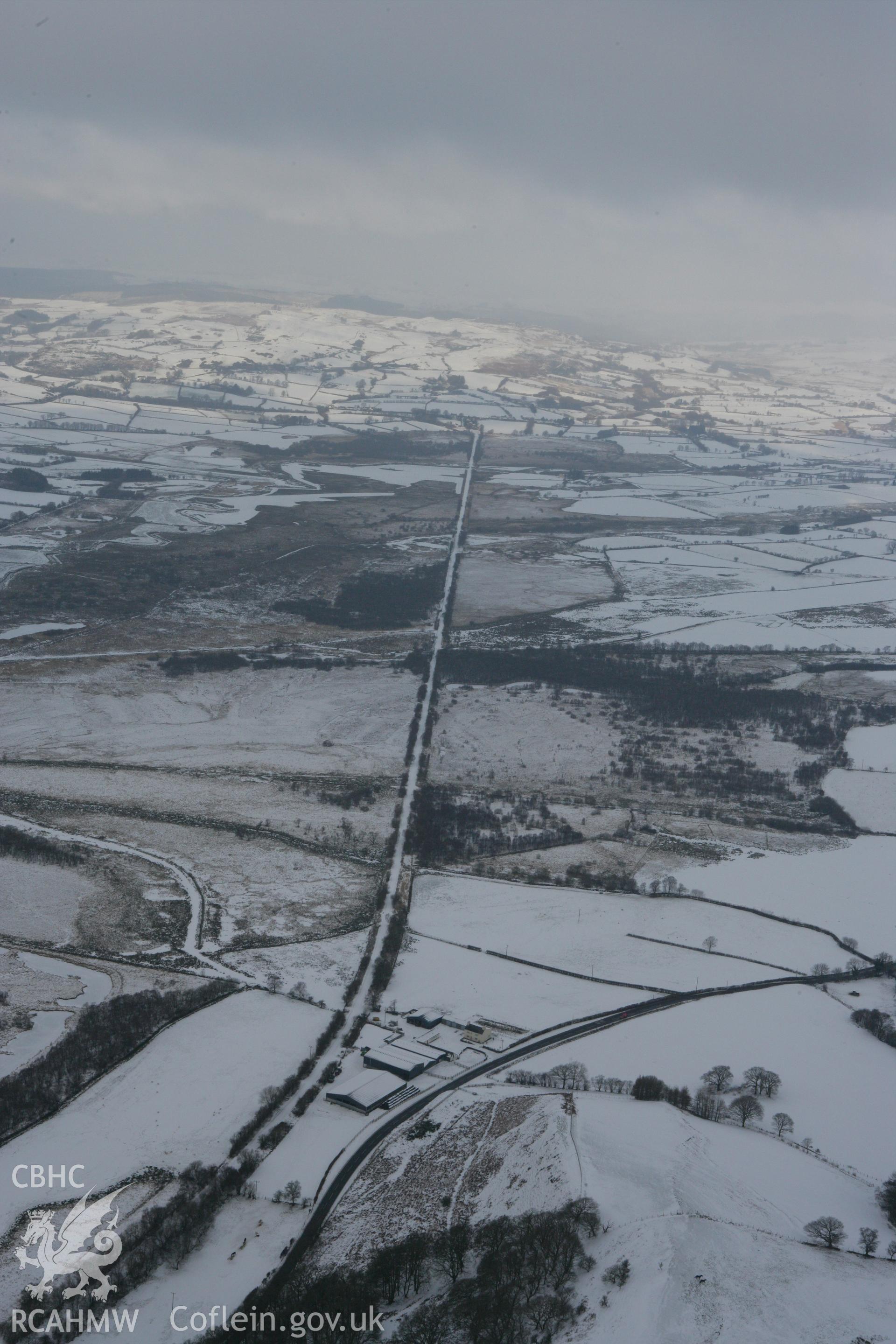 RCAHMW colour oblique photograph of Allt Ddu Railway Halt, Cors Caron, Tregaron Bog. Taken by Toby Driver on 02/12/2010.