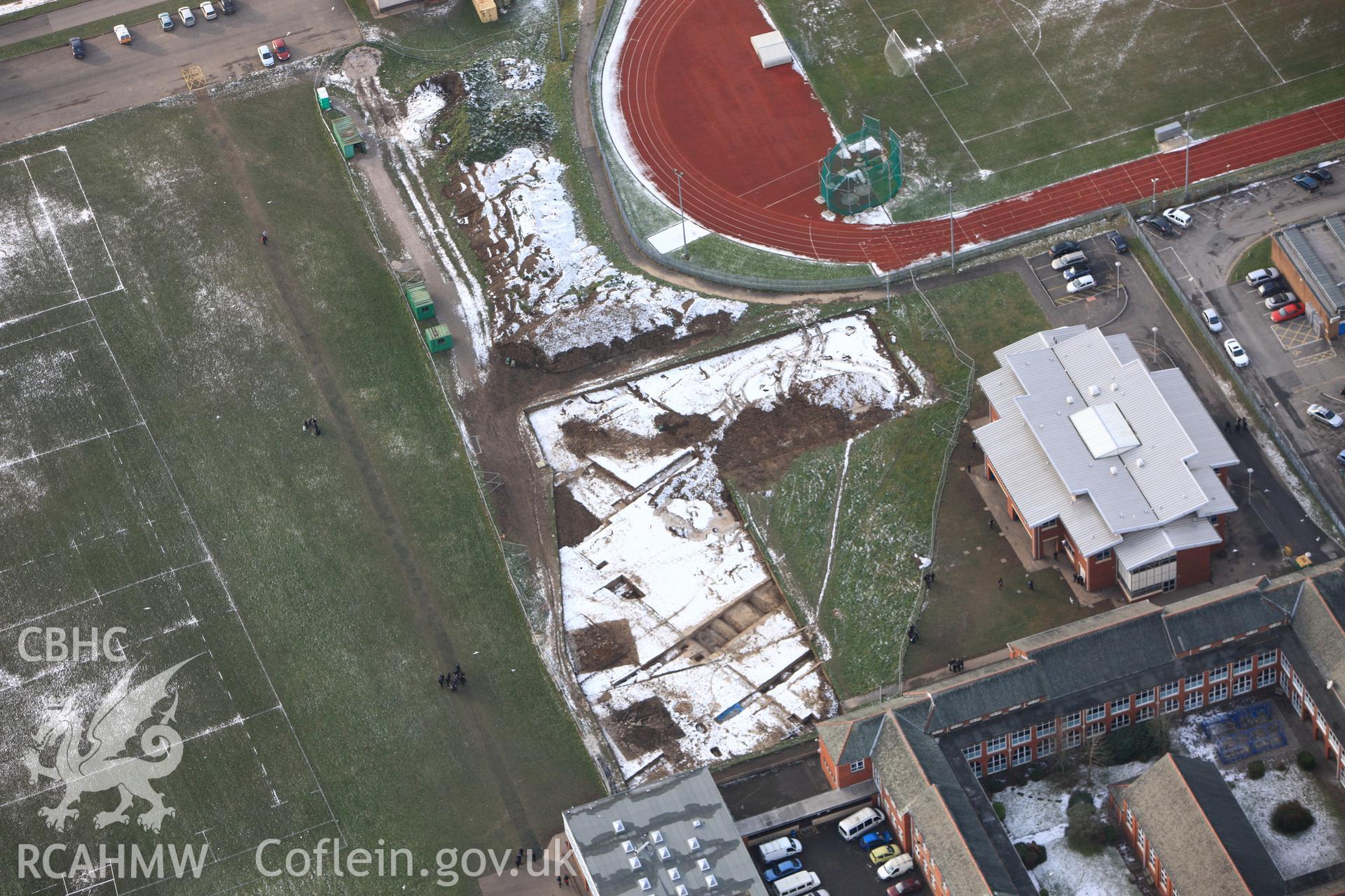 RCAHMW colour oblique photograph of Neath Auxilary Fort, under excavation by GGAT. Taken by Toby Driver on 01/12/2010.