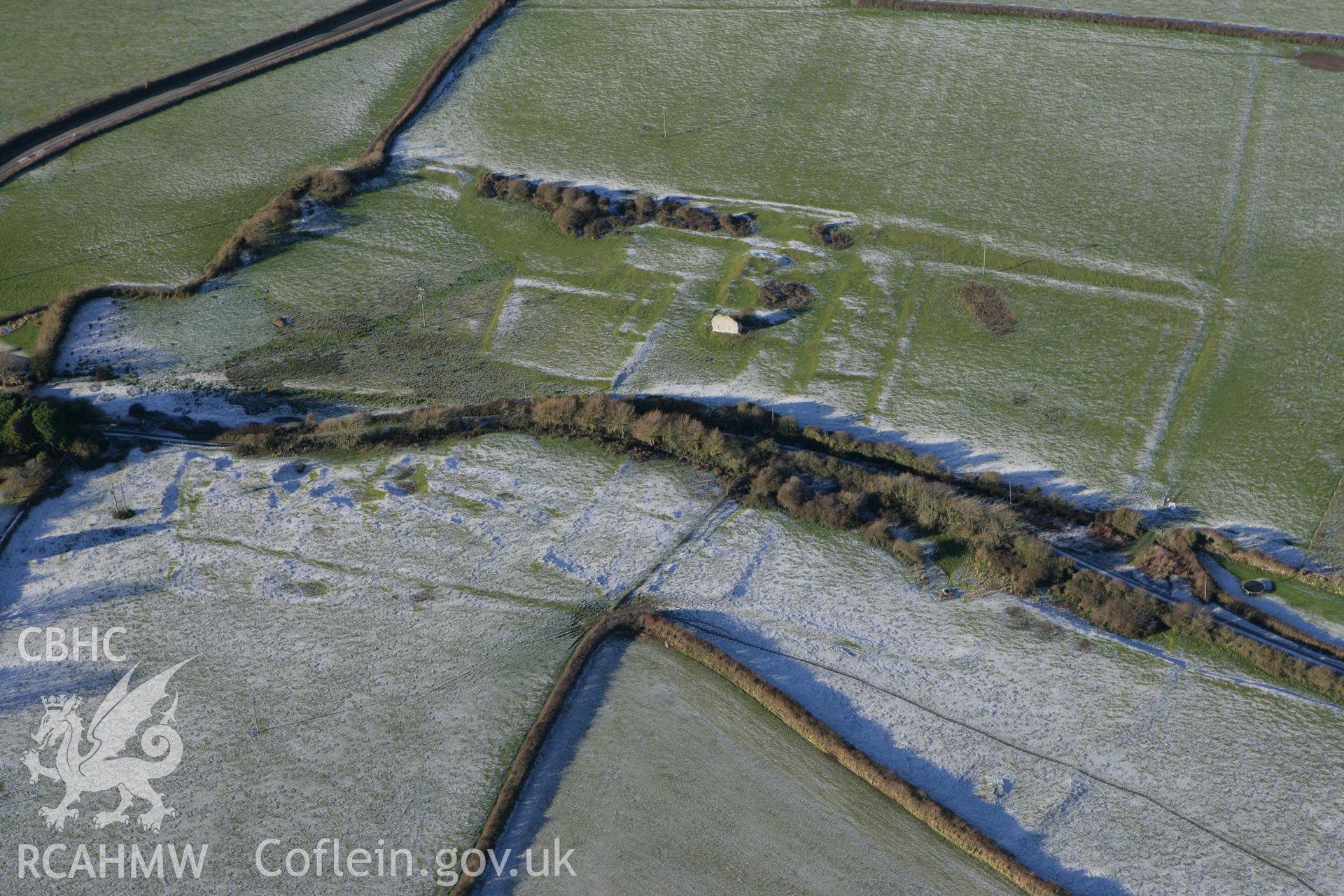 RCAHMW colour oblique photograph of Marcross, grange earthworks, with frost. Taken by Toby Driver on 08/12/2010.