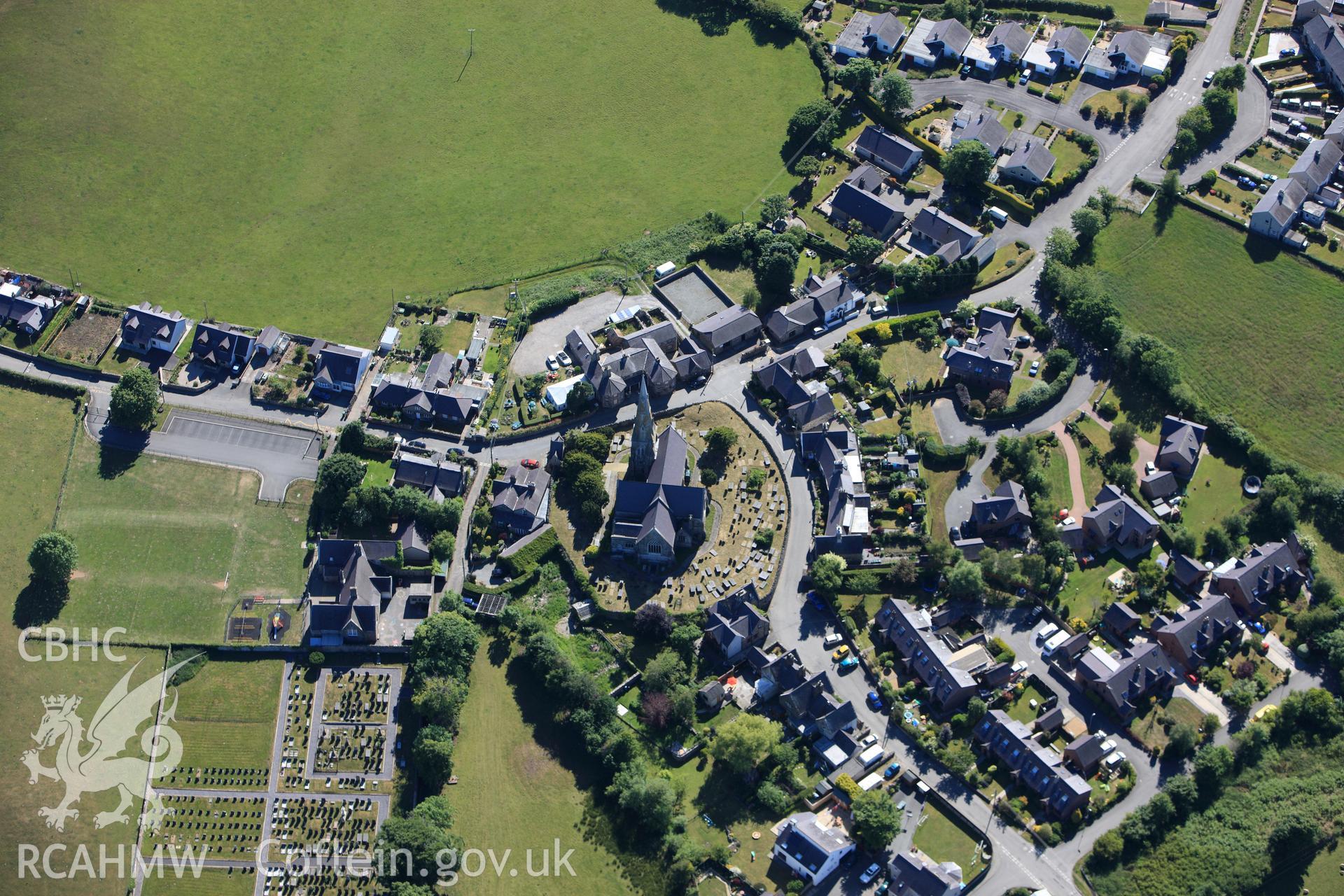 RCAHMW colour oblique photograph of Llandwrog village, with St Twrog's Church. Taken by Toby Driver on 16/06/2010.