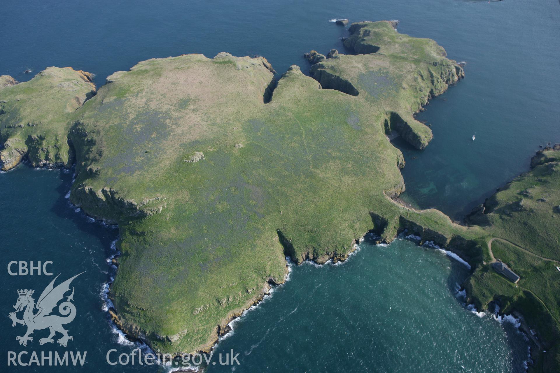 RCAHMW colour oblique photograph of South Castle, Skomer Island, The Neck promontory fort,. Taken by Toby Driver on 25/05/2010.