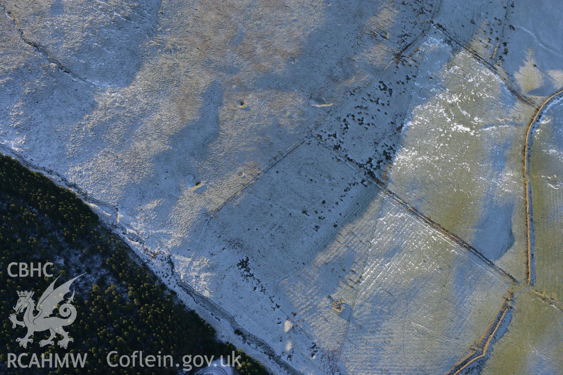 RCAHMW colour oblique photograph of Foel Fynyddau, settlement remains. Taken by Toby Driver on 08/12/2010.