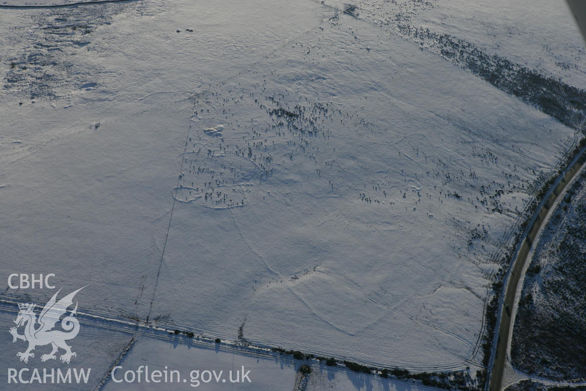 RCAHMW colour oblique photograph of Bernard's Well Mountain, prehistoric settlement, view from the north. Taken by Toby Driver on 01/12/2010.