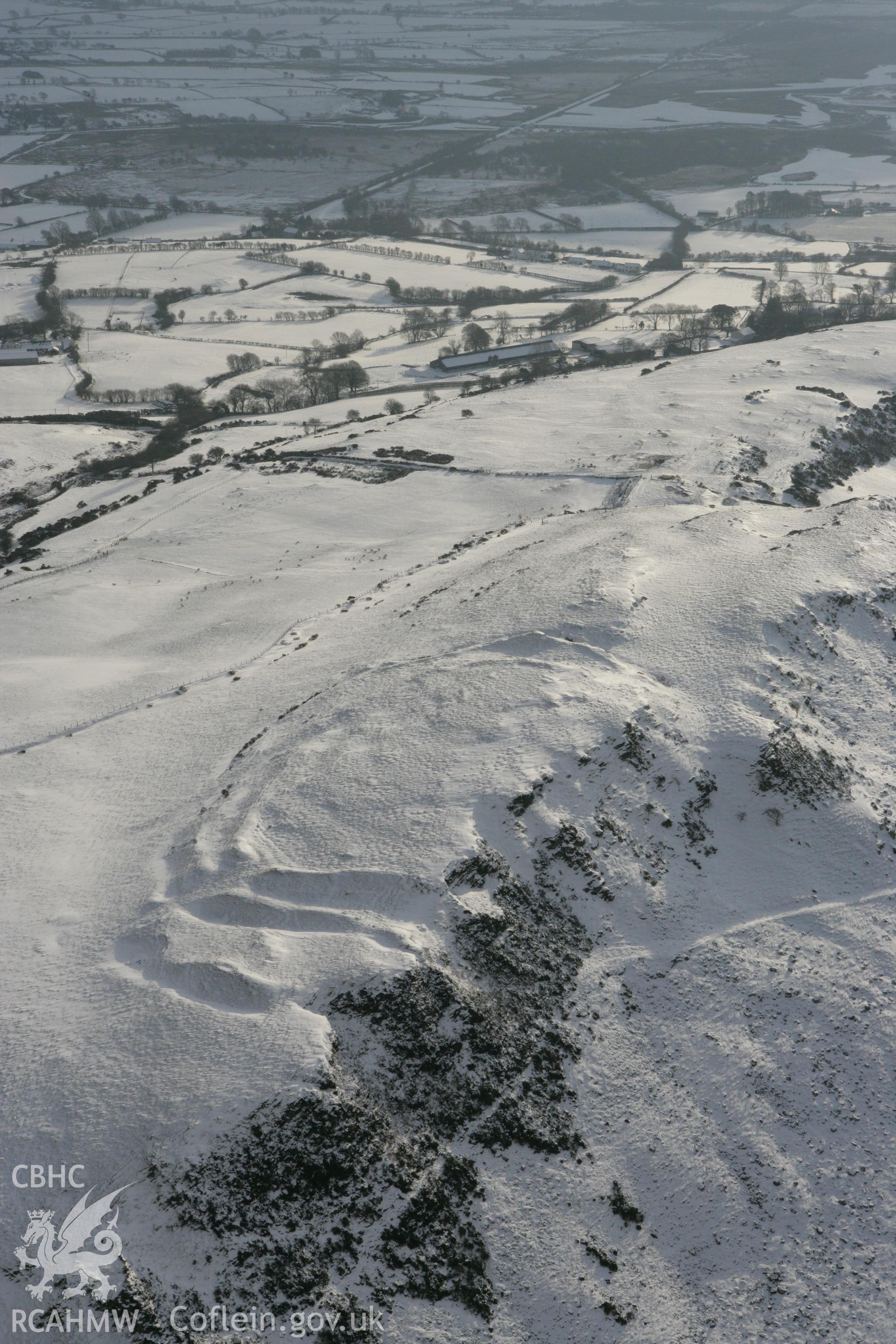 RCAHMW colour oblique photograph of Pen-y-ffrwd Llwyd hillfort. Taken by Toby Driver on 02/12/2010.