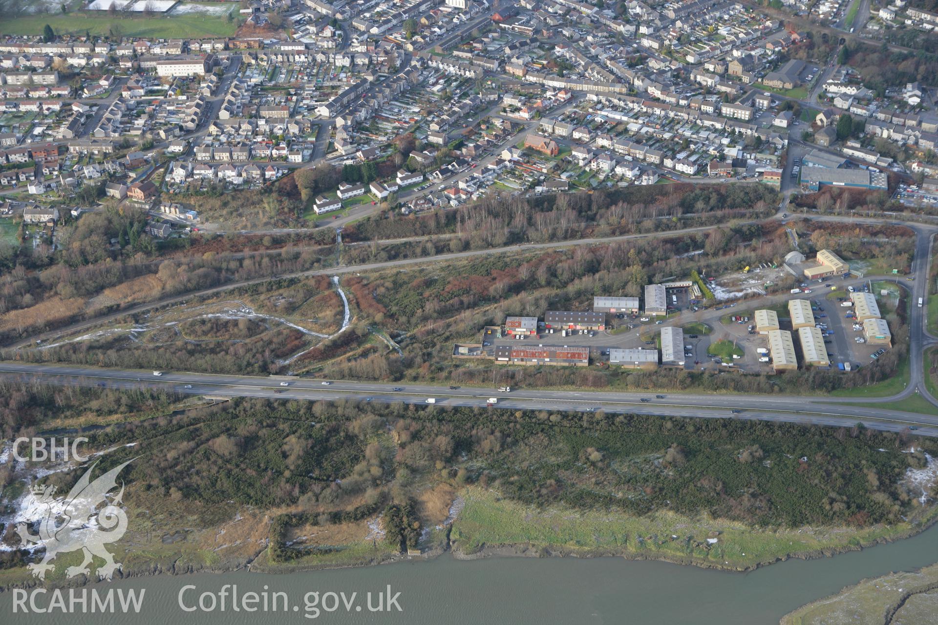 RCAHMW colour oblique photograph of the Mines Royal Copper Works Railway, showing the Skewen cutting and tramroad bridge of the Tennant canal. Taken by Toby Driver on 01/12/2010.