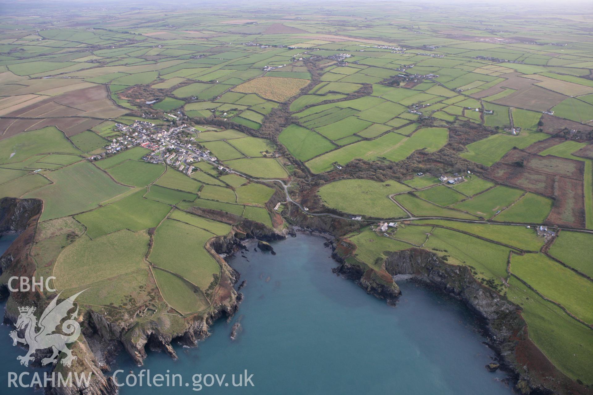 RCAHMW colour oblique photograph of Trefin (Trevin) village. Taken by Toby Driver on 16/11/2010.