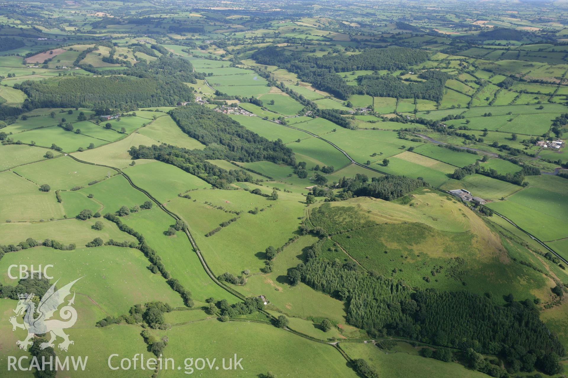 RCAHMW colour oblique photograph of Llwyn Bryn-Dinas Camp. Taken by Toby Driver on 21/07/2010.