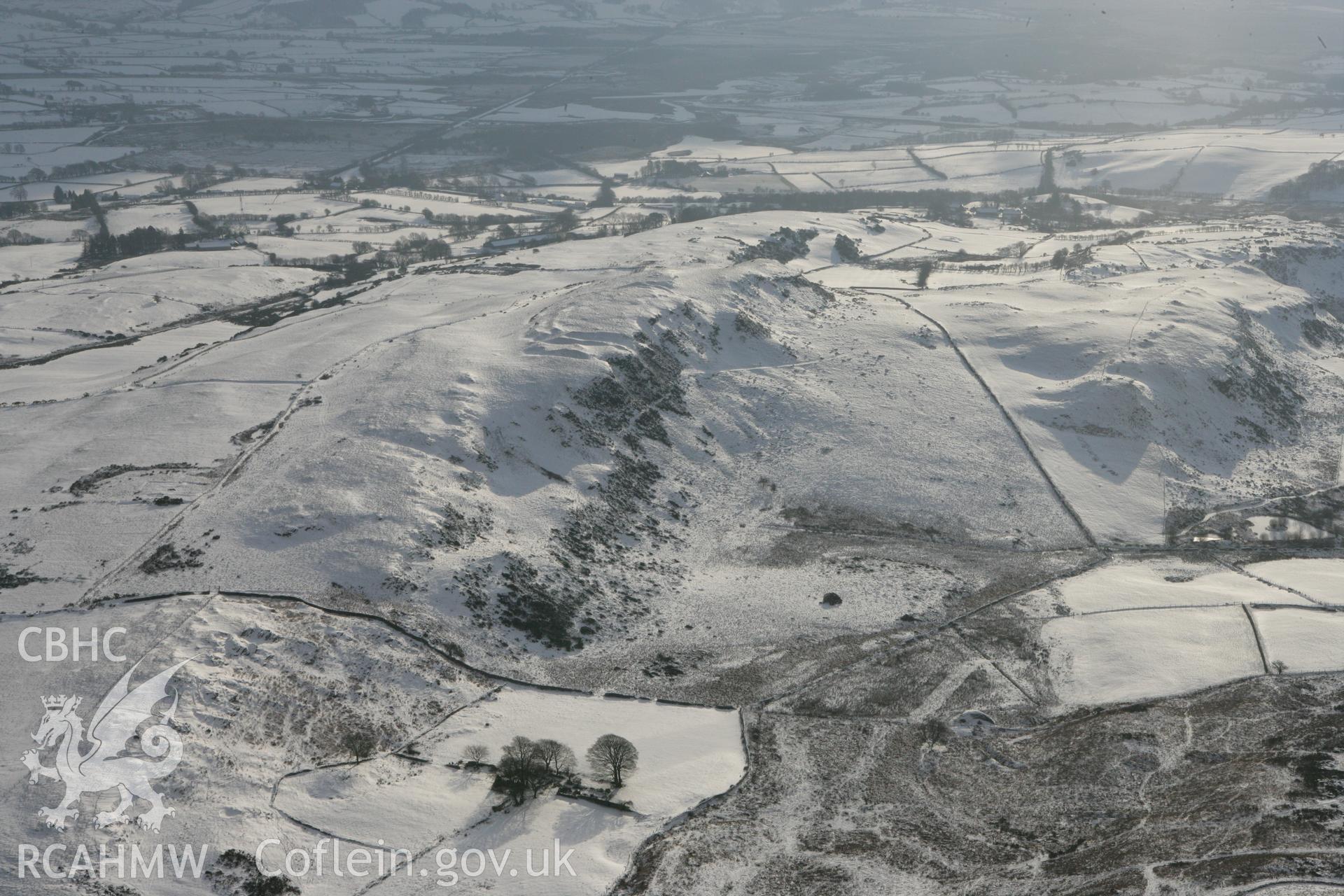 RCAHMW colour oblique photograph of Pen-y-ffrwd Llwyd hillfort. Taken by Toby Driver on 02/12/2010.