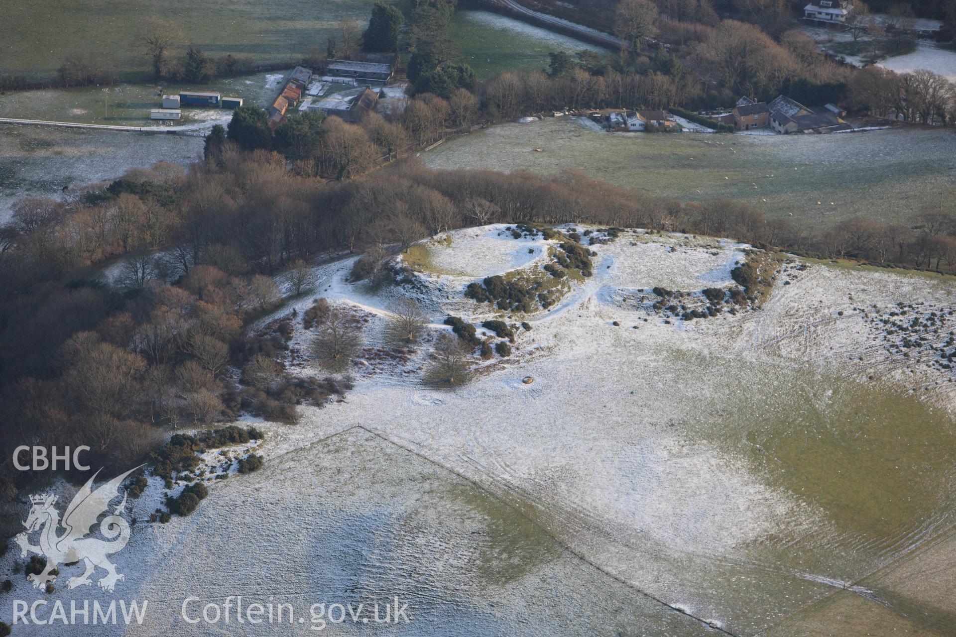 RCAHMW colour oblique photograph of Castell Tan y Castell, with snow. Taken by Toby Driver on 02/12/2010.