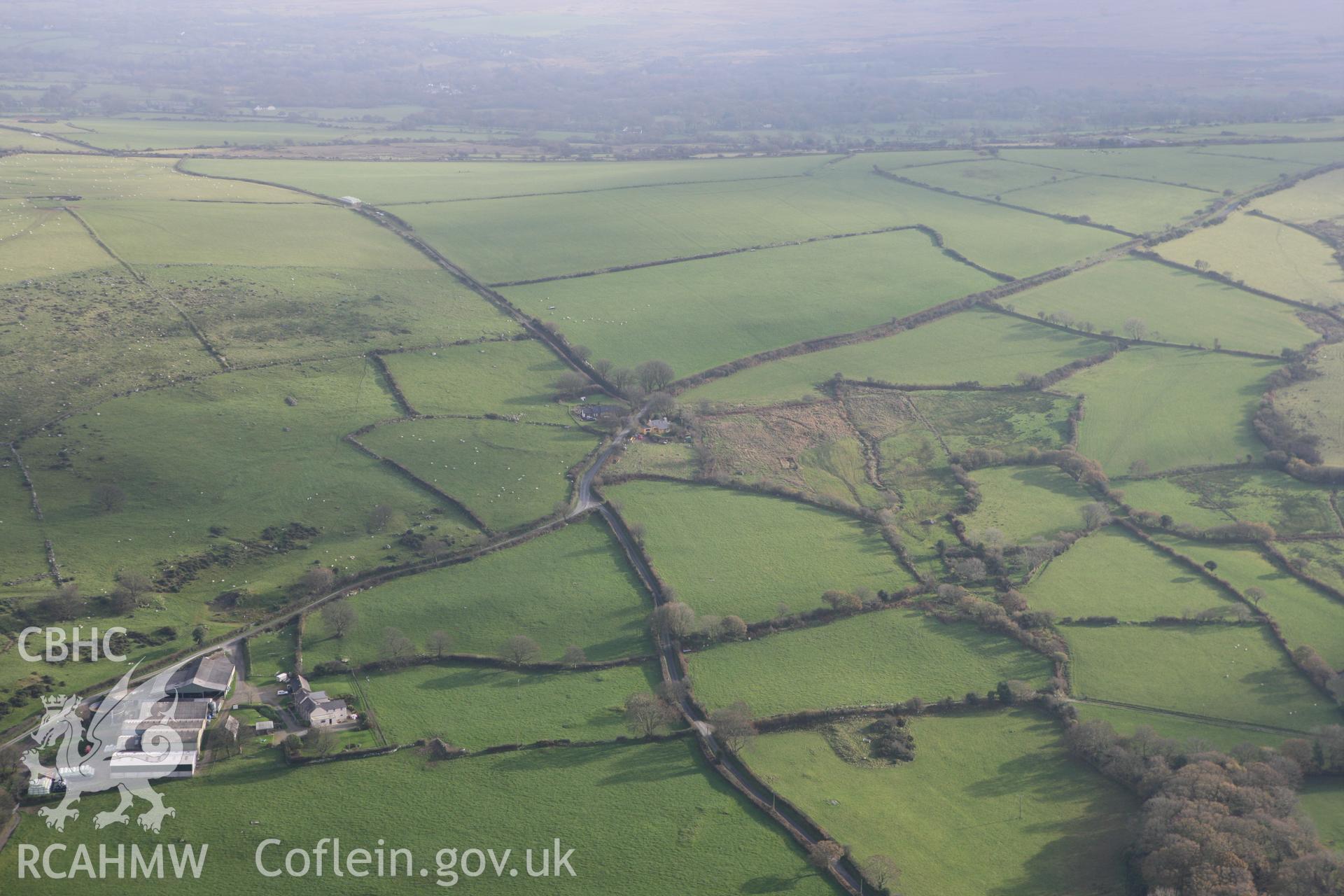 RCAHMW colour oblique photograph of Troed-y-rhiw (Cil-gwyn-mawr) Enclosure. Taken by Toby Driver on 16/11/2010.