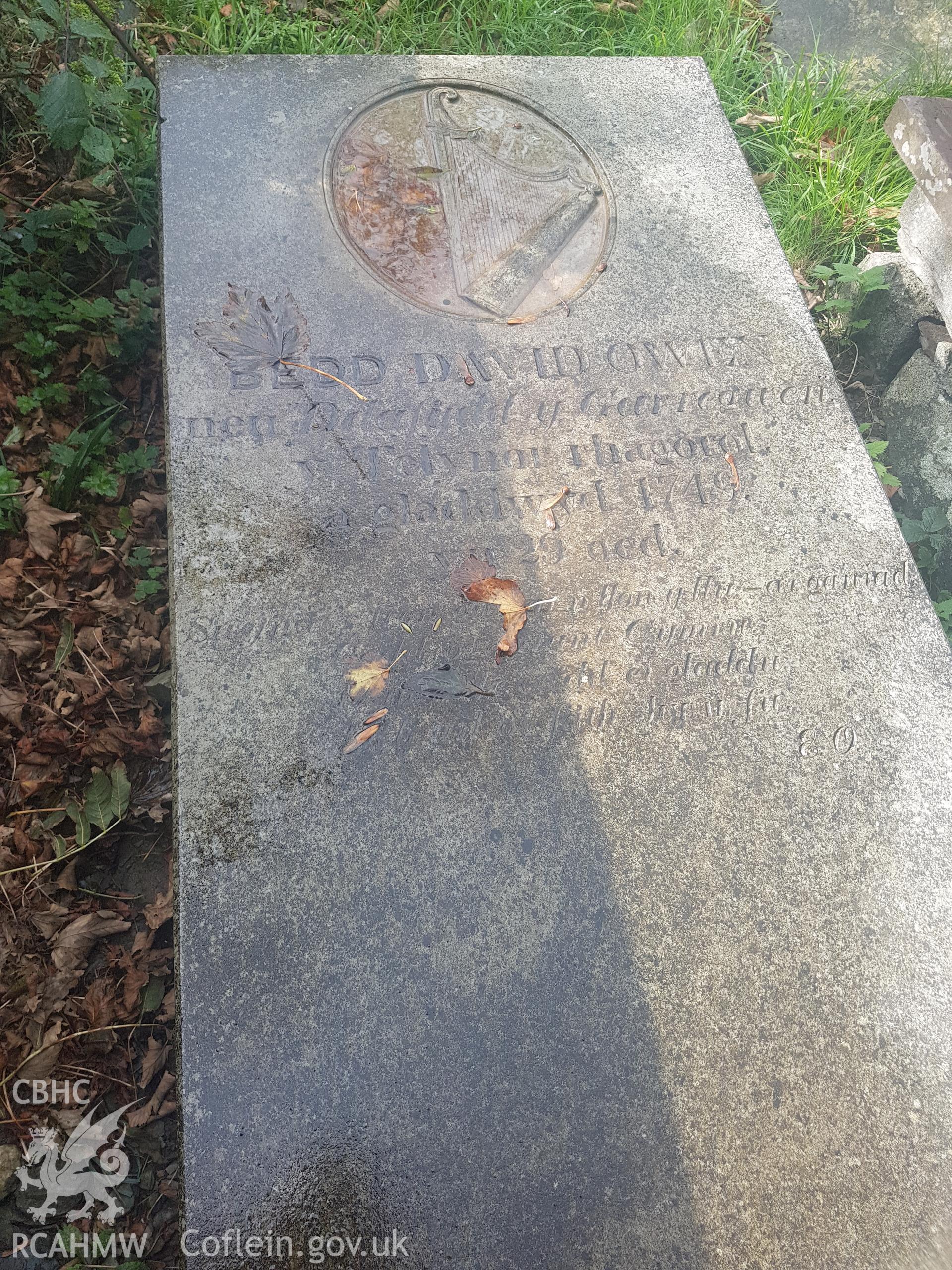 Gravestone of  David Owen (1712–1741),  known as "Dafydd y Garreg Wen". Photographed by Helen Rowe of RCAHMW on 10th October 2020.