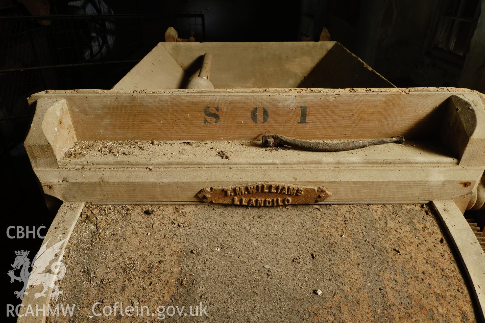 Colour photograph showing Blackpool Mill - ground floor, winnowing machine detail. Produced as part of Historic Building Recording for Blackpool Mill, carried out by Richard Hayman, June 2021.