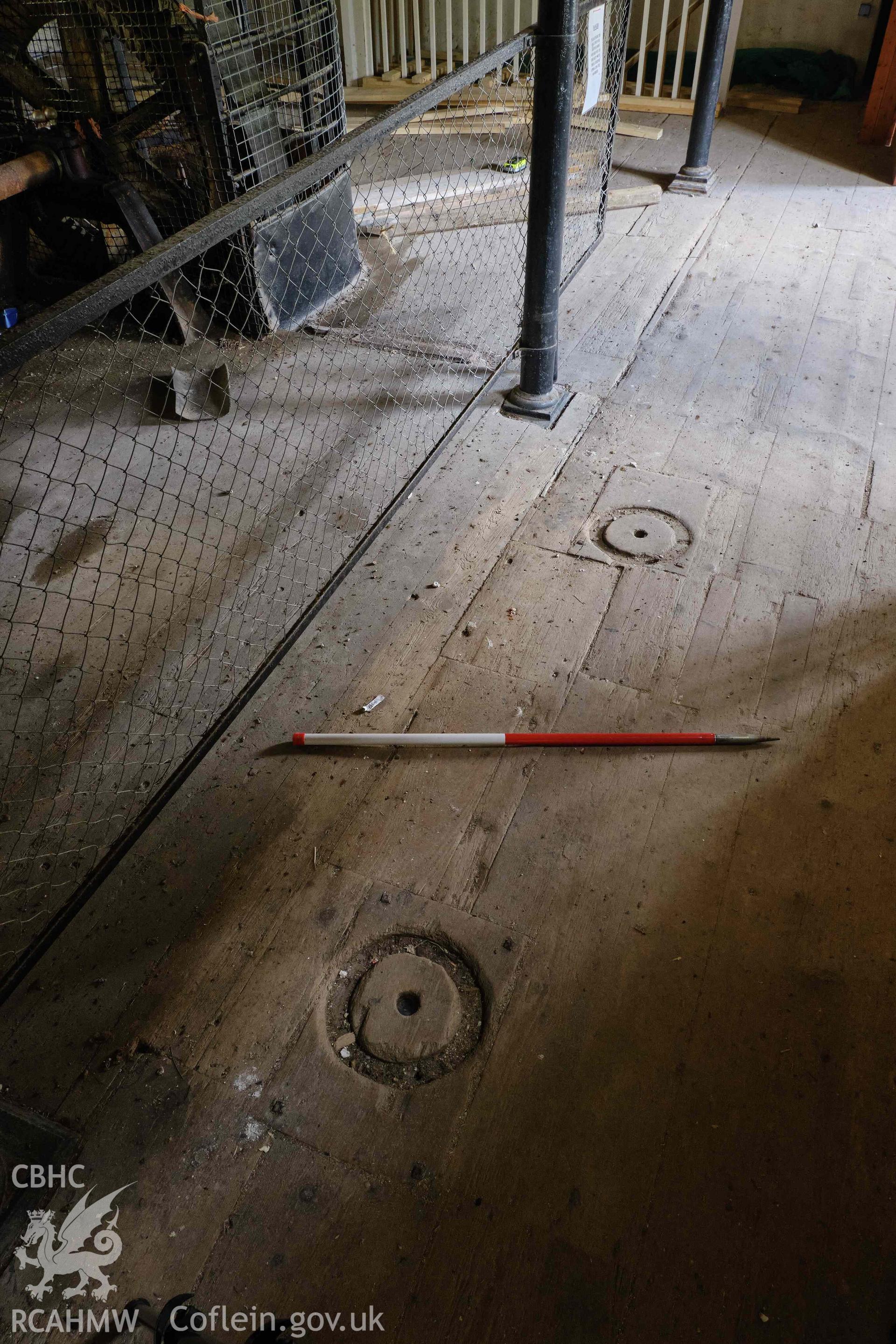 Colour photograph showing Blackpool Mill - ground floor, footprint of former fixtures, looking SW. Produced as part of Historic Building Recording for Blackpool Mill, carried out by Richard Hayman, June 2021.