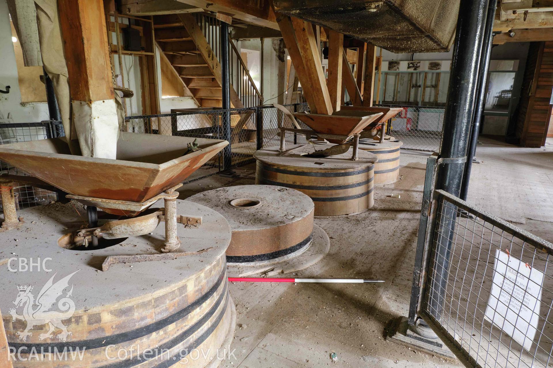 Colour photograph showing Blackpool Mill - 1st floor, millstones looking SW. Produced as part of Historic Building Recording for Blackpool Mill, carried out by Richard Hayman, June 2021.