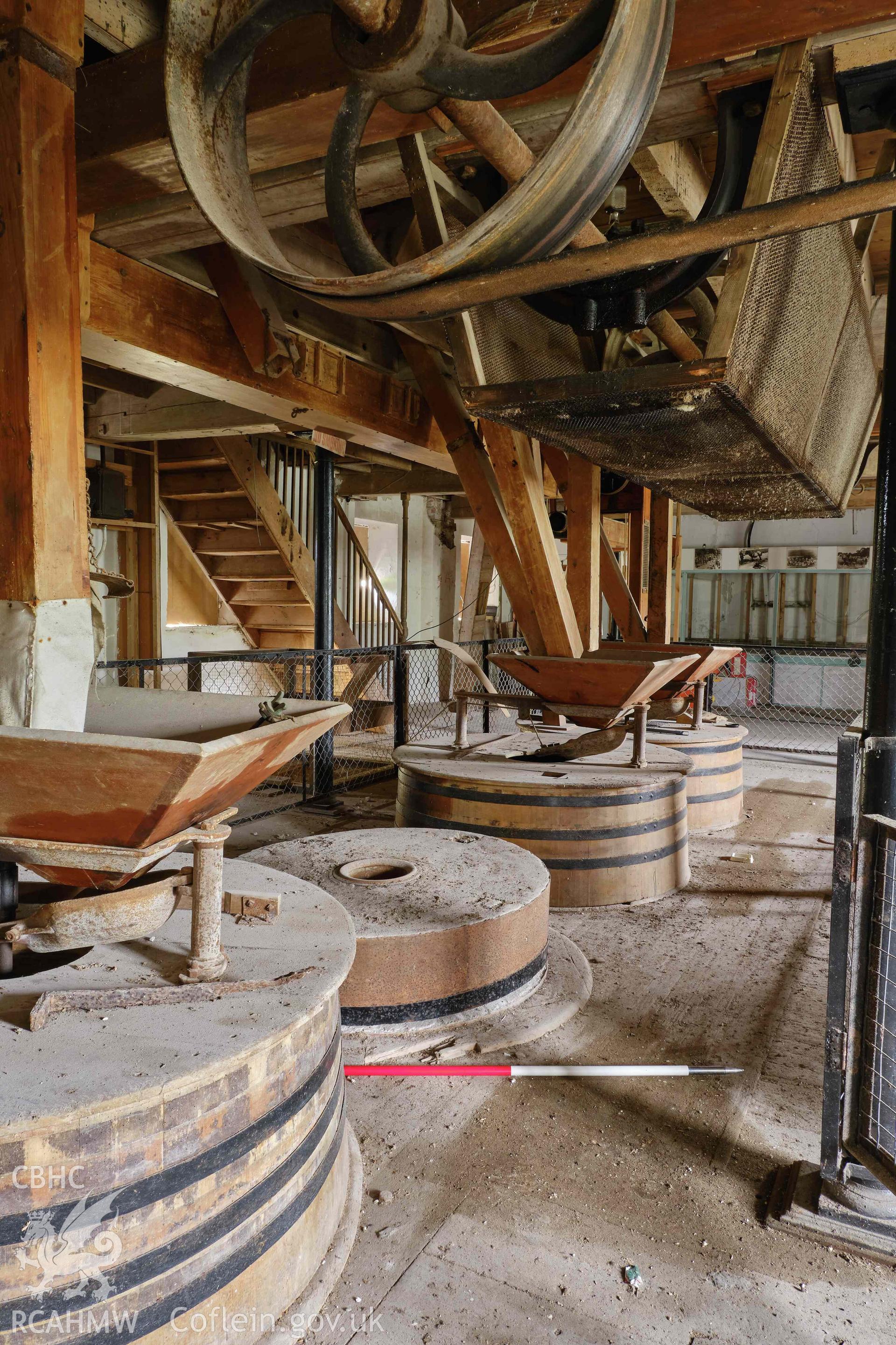 Colour photograph showing Blackpool Mill - 1st floor, millstones looking SW. Produced as part of Historic Building Recording for Blackpool Mill, carried out by Richard Hayman, June 2021.