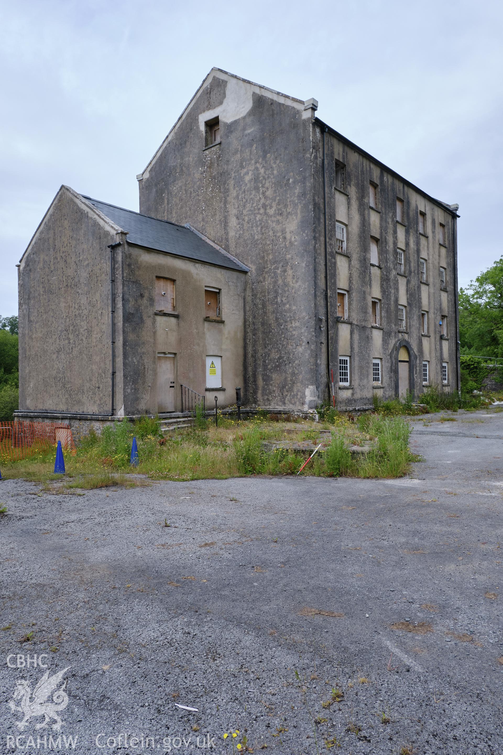 Colour photograph showing Blackpool Mill - mill & SW wing, looking NE. Produced as part of Historic Building Recording for Blackpool Mill, carried out by Richard Hayman, June 2021.