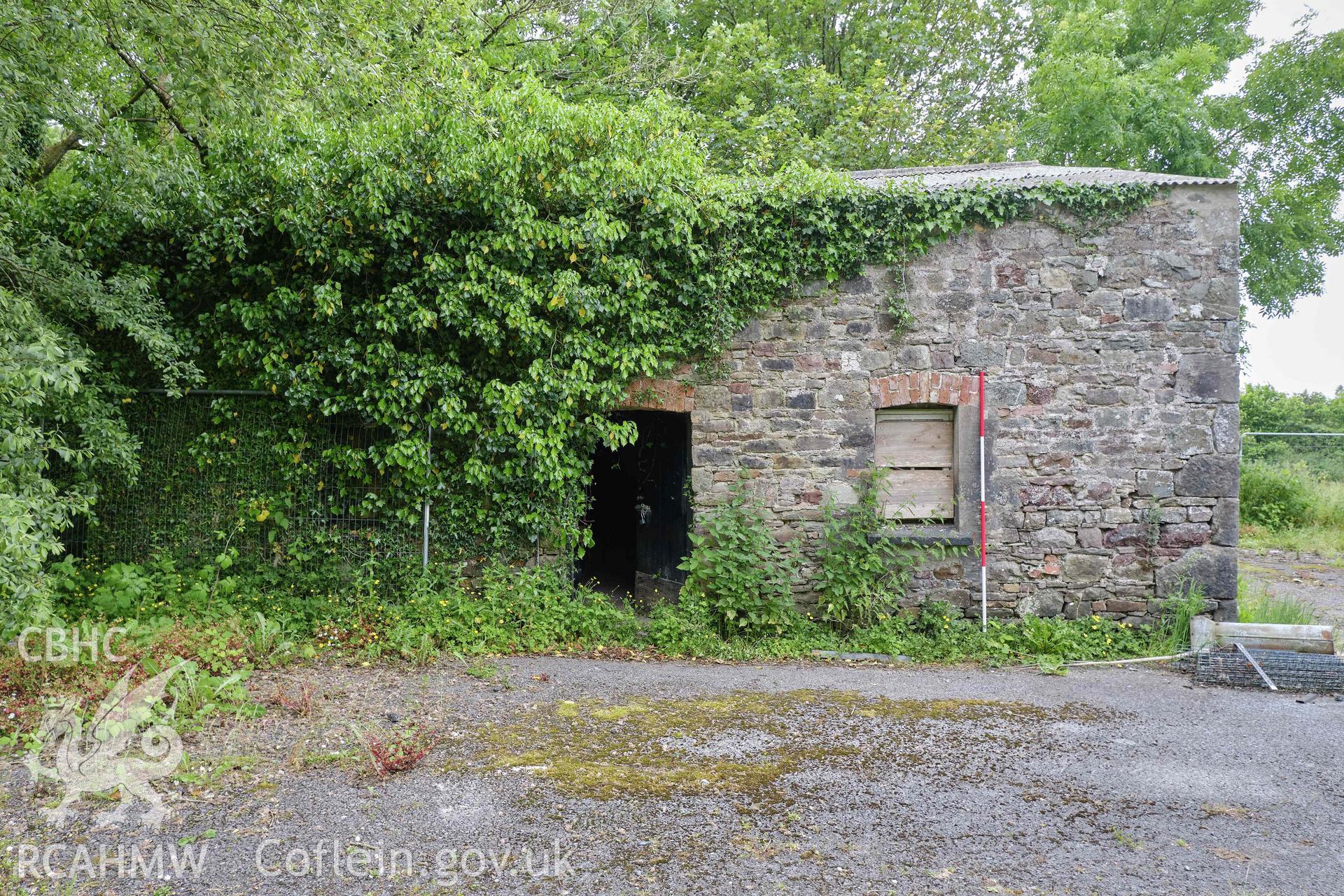 Colour photograph showing Blackpool Mill - former cottage & forge, E front. Produced as part of Historic Building Recording for Blackpool Mill, carried out by Richard Hayman, June 2021.