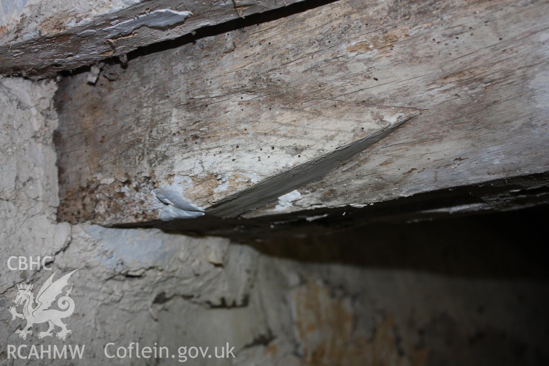 The ‘broach stop’ on a sixteenth-century beam. Photographed by Richard Suggett of RCAHMW in June 2020.