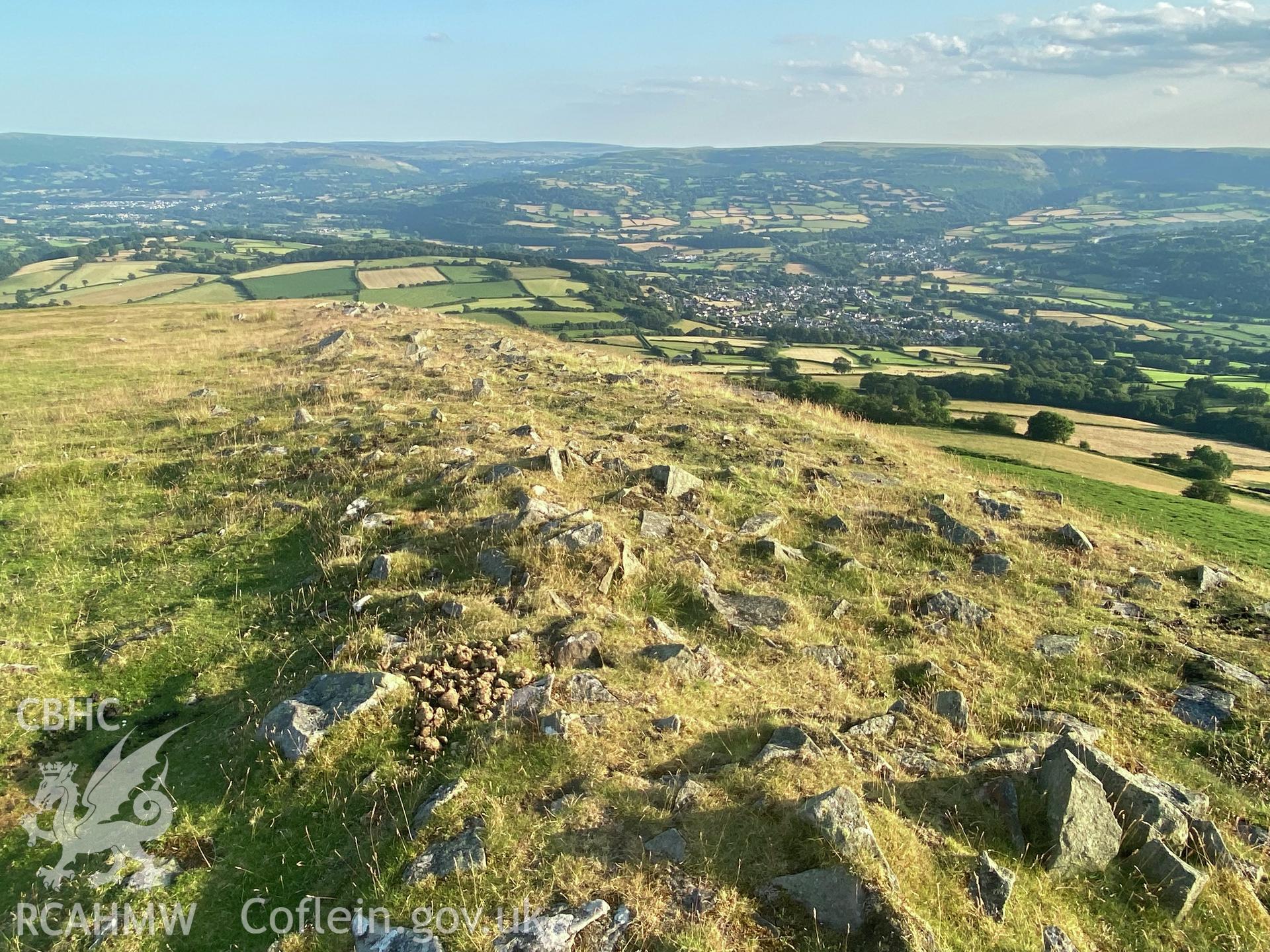 Digital colour photograph showing Crug Hywel camp (west rampart), produced by Paul R Davis in 2021.