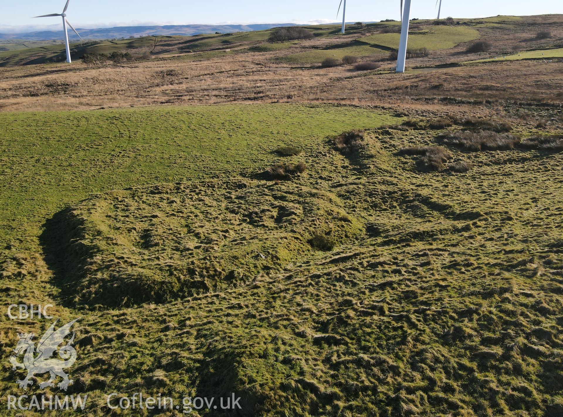 Digital colour photograph showing Y Grug earthwork, Trefenter, produced by Paul R Davis in 2021.