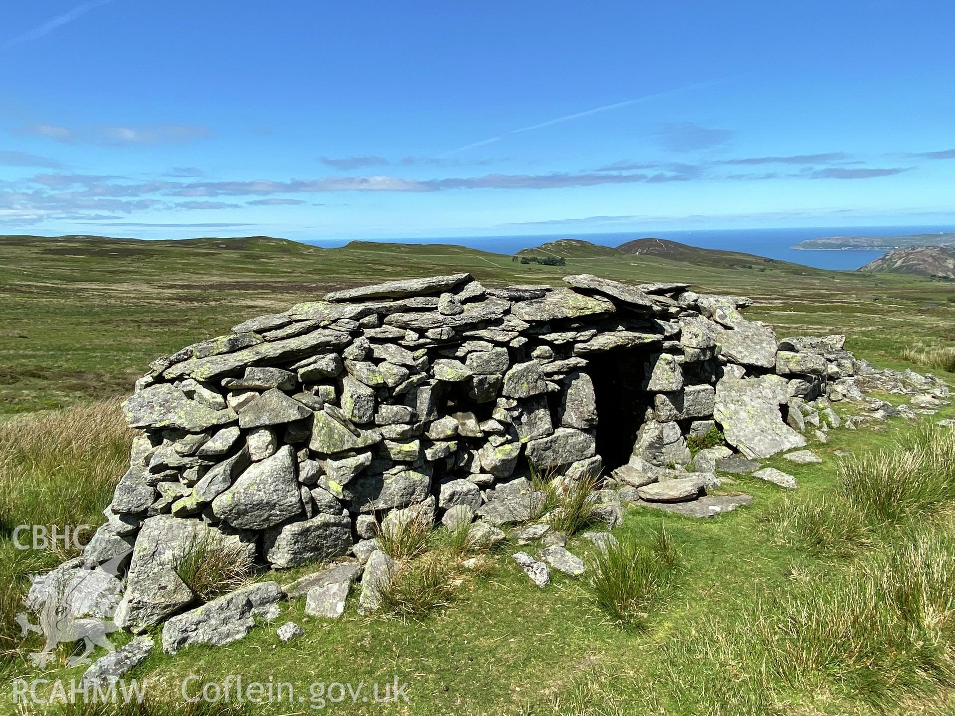 Digital colour photograph showing Talyfan peat house, produced by Paul R Davis in 2021.