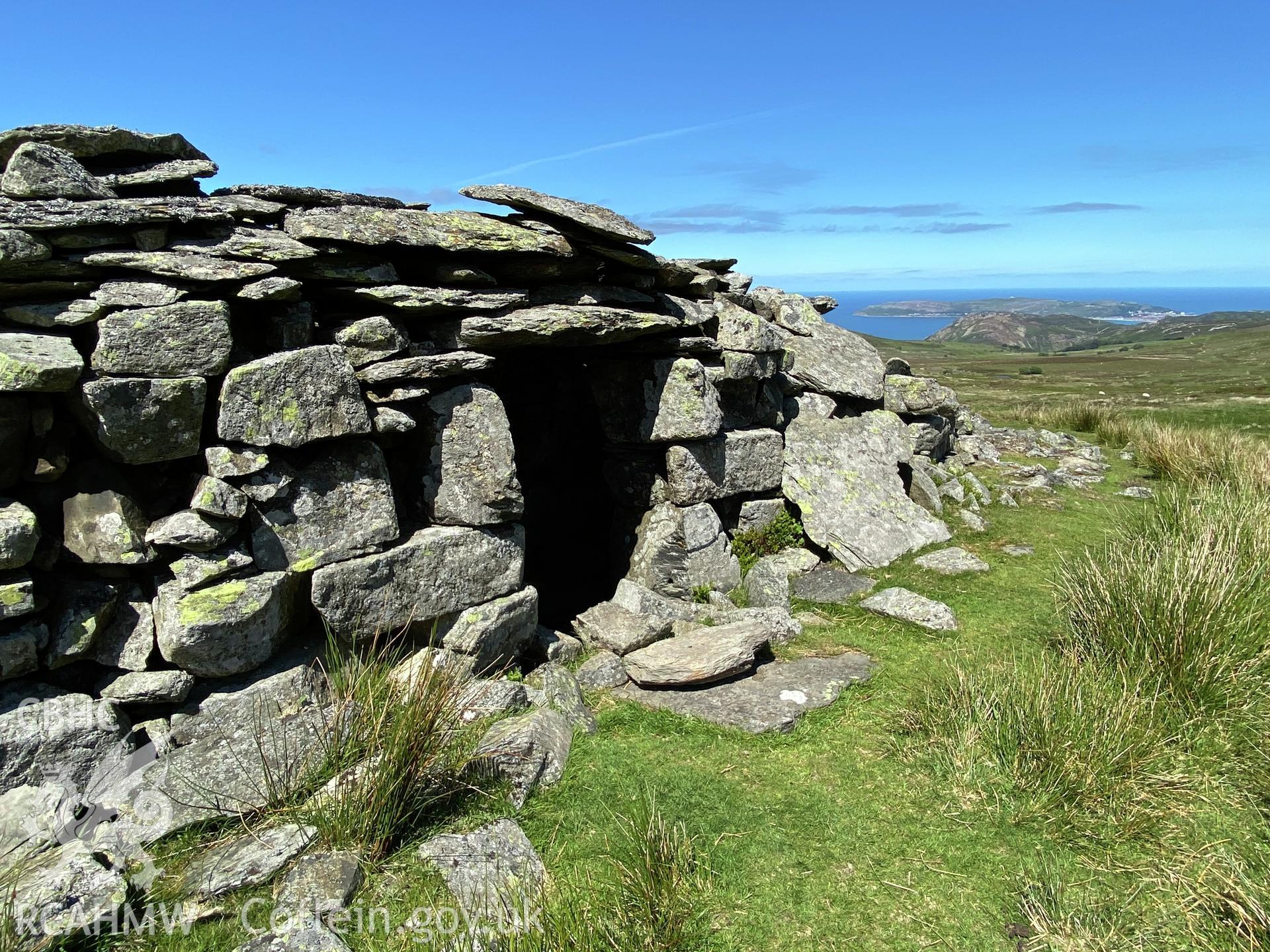 Digital colour photograph showing Talyfan peat house, produced by Paul R Davis in 2021.