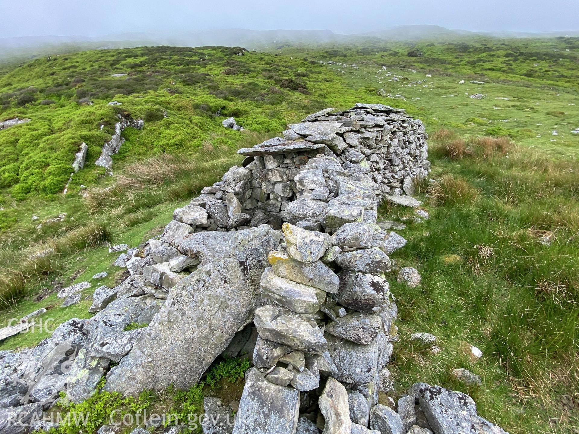 Digital colour photograph showing Talyfan peat house, produced by Paul R Davis in 2021.