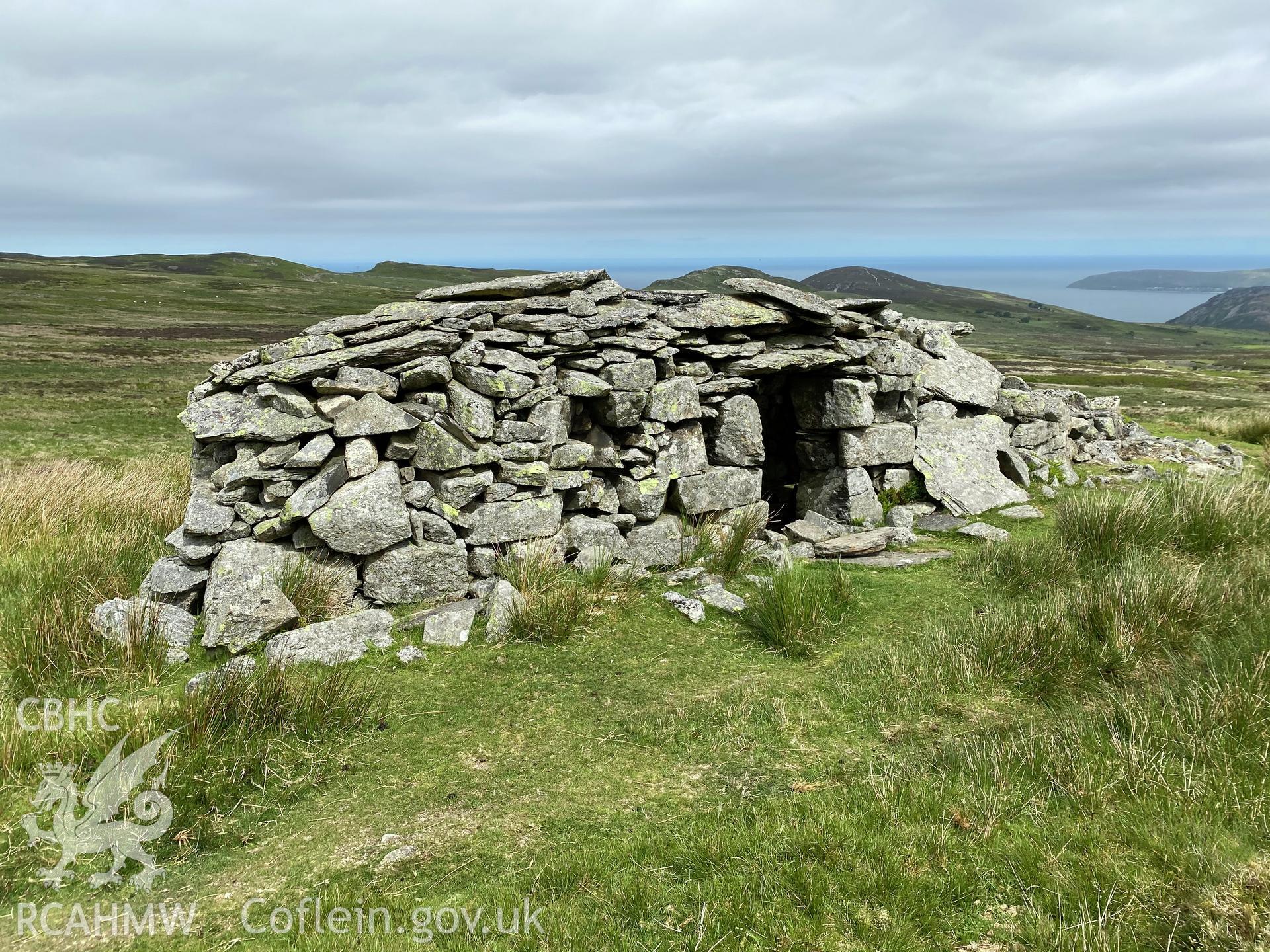 Digital colour photograph showing Talyfan peat house, produced by Paul R Davis in 2021.