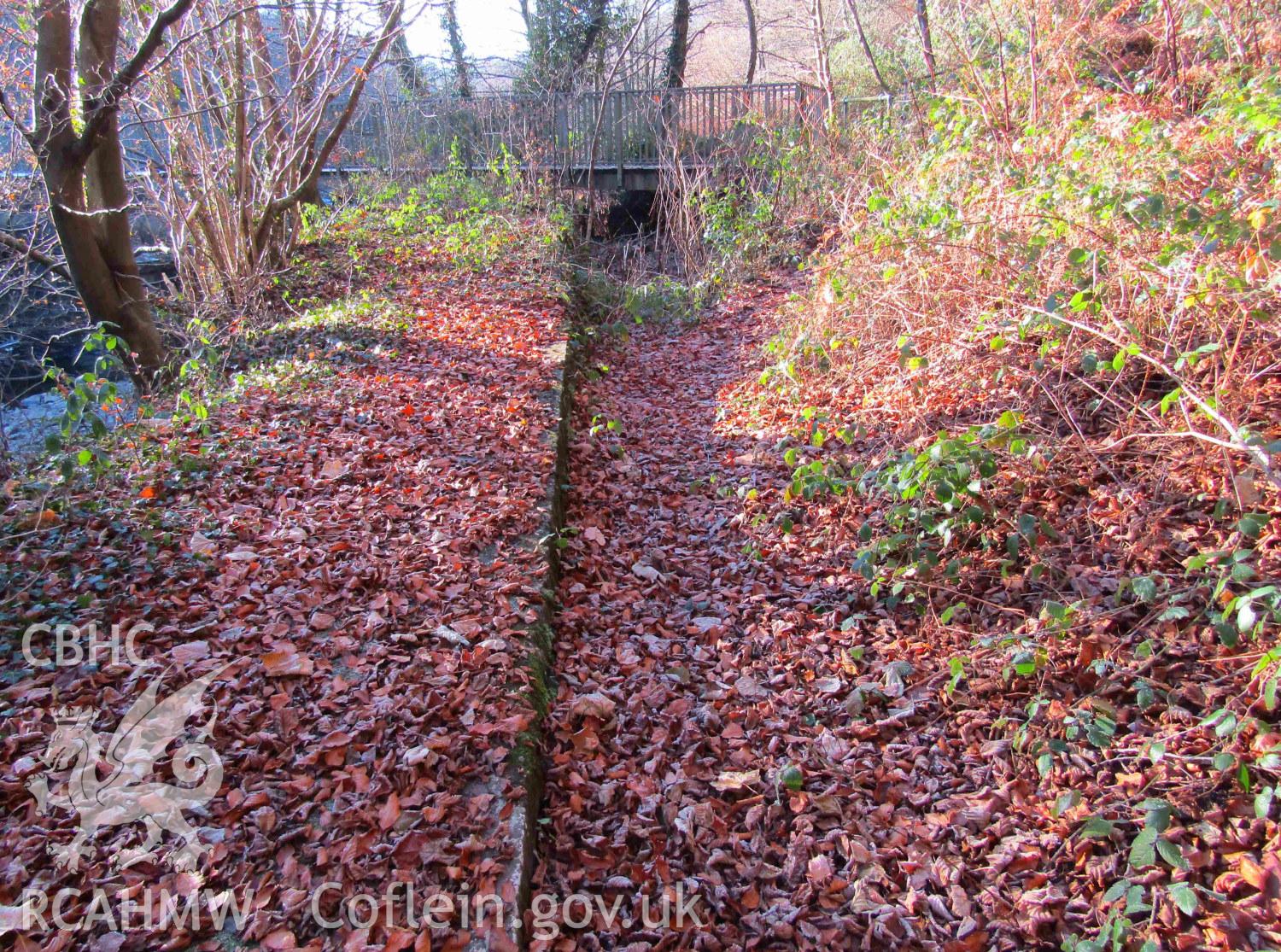 Photograph showing view from the south-west of feeder on west bank of Taff with the aqueduct in the distance. Produced by Kelvin Merriott in December 2016.