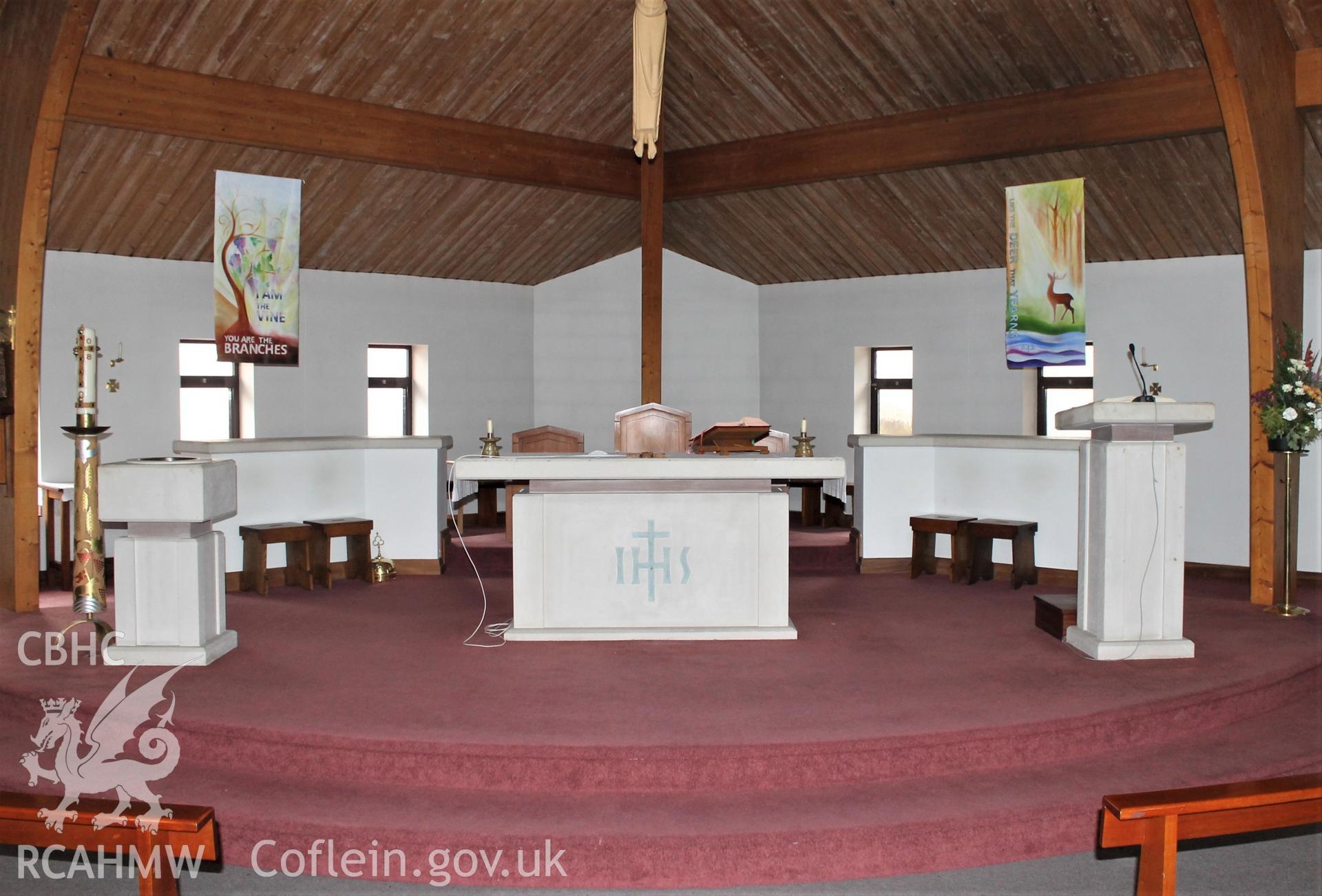 Digital colour photograph showing the sanctuary at Our Lady of Peace Catholic church, Llanelli.