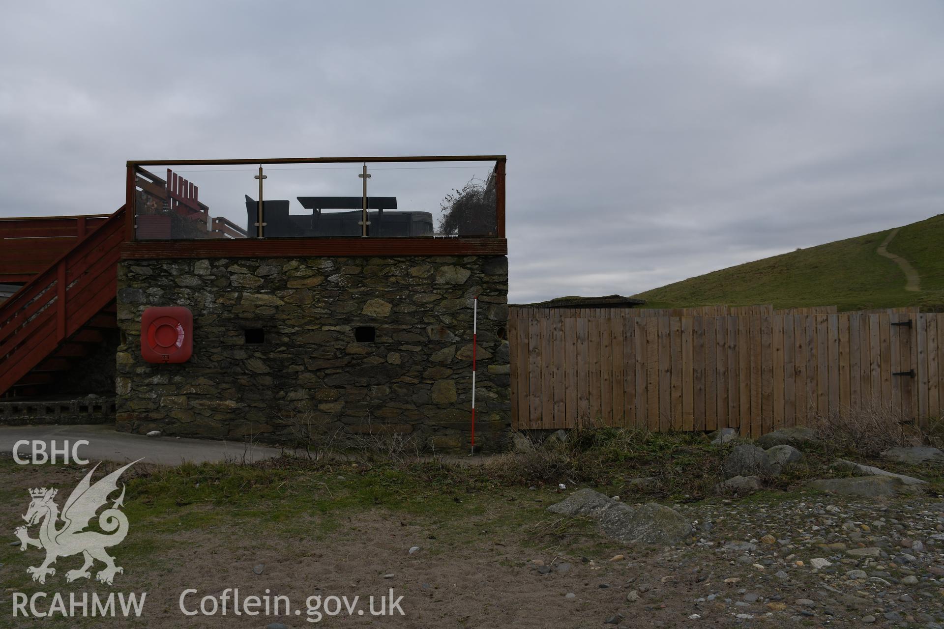 Pillbox with 2m scale. Photograph taken in January 2022 by Hannah Genders Boyd as part of repeat monitoring and survey by the CHERISH project. © Crown: CHERISH PROJECT 2022. Produced with EU funds through the Ireland Wales Co-operation Programme 2014-2023. All material made freely available through the Open Government Licence.