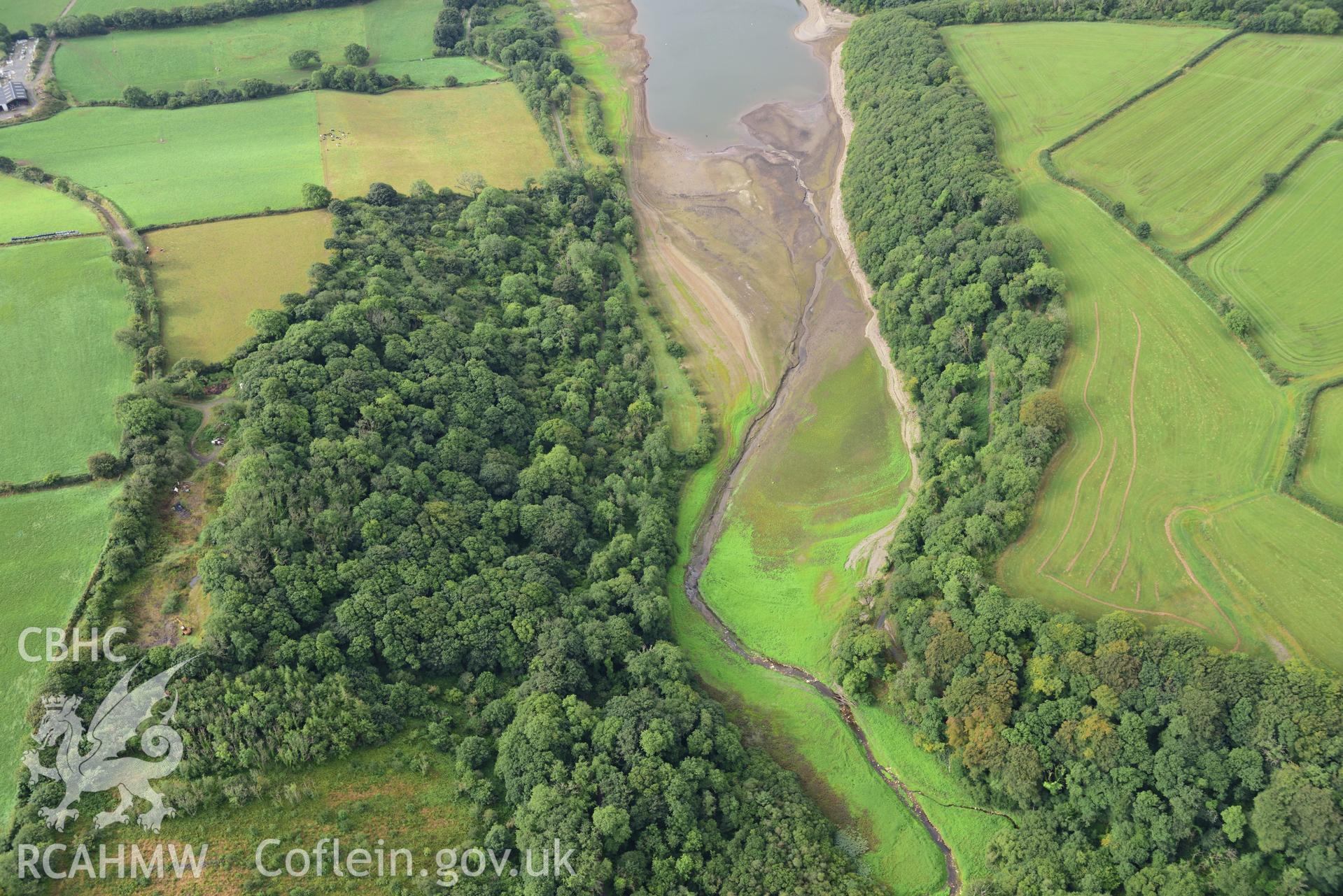 Detailed view of Llys y Fran Reservoir, Pembrokeshire, under drought conditions. Oblique aerial photograph taken during the Royal Commission’s programme of archaeological aerial reconnaissance by Toby Driver on 19 August 2022.