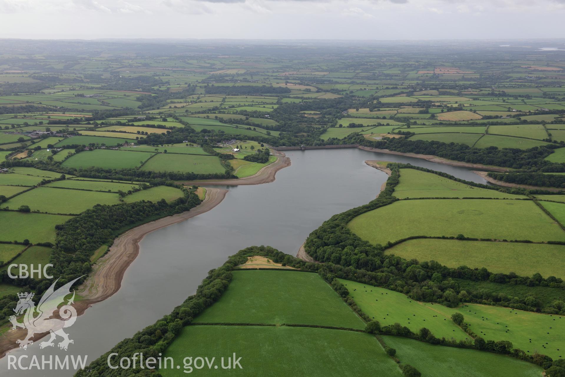 Llys y Fran Reservoir, Pembrokeshire, under drought conditions. Oblique aerial photograph taken during the Royal Commission’s programme of archaeological aerial reconnaissance by Toby Driver on 19 August 2022.